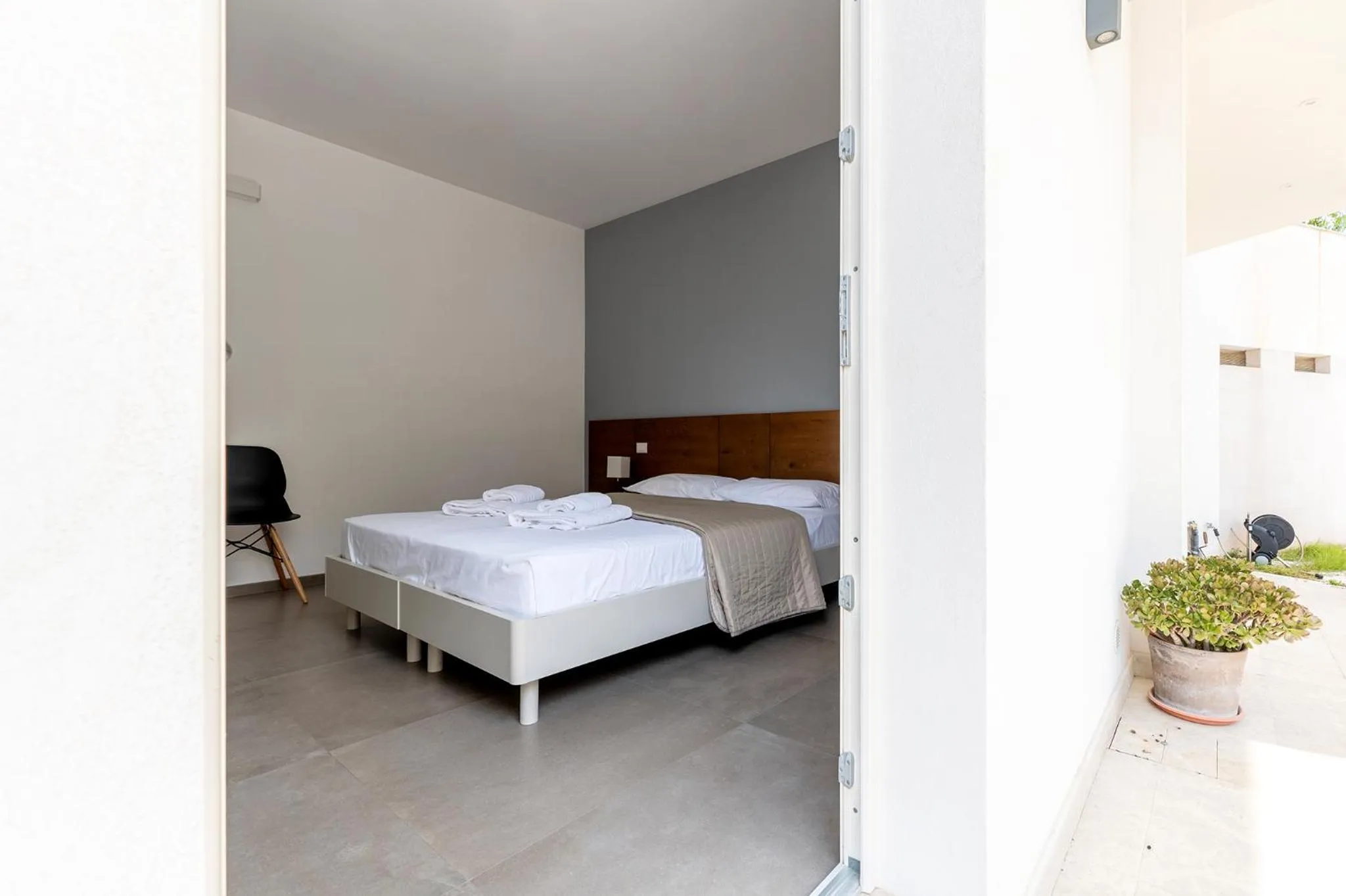 Bed in Serafini Rooms