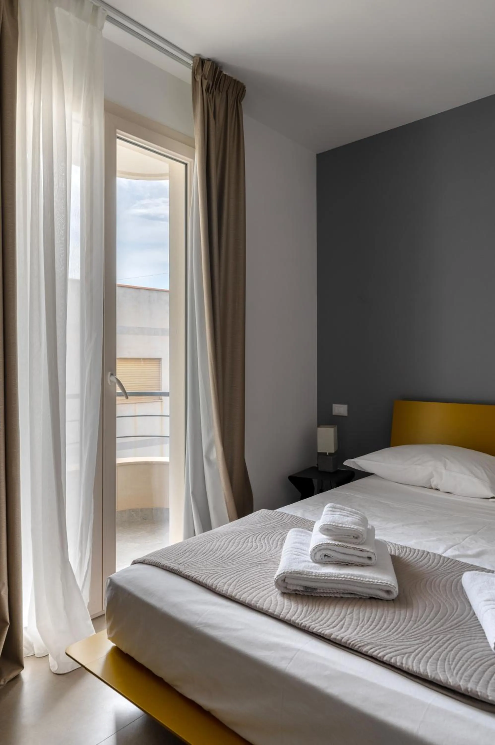 Bed in Serafini Rooms