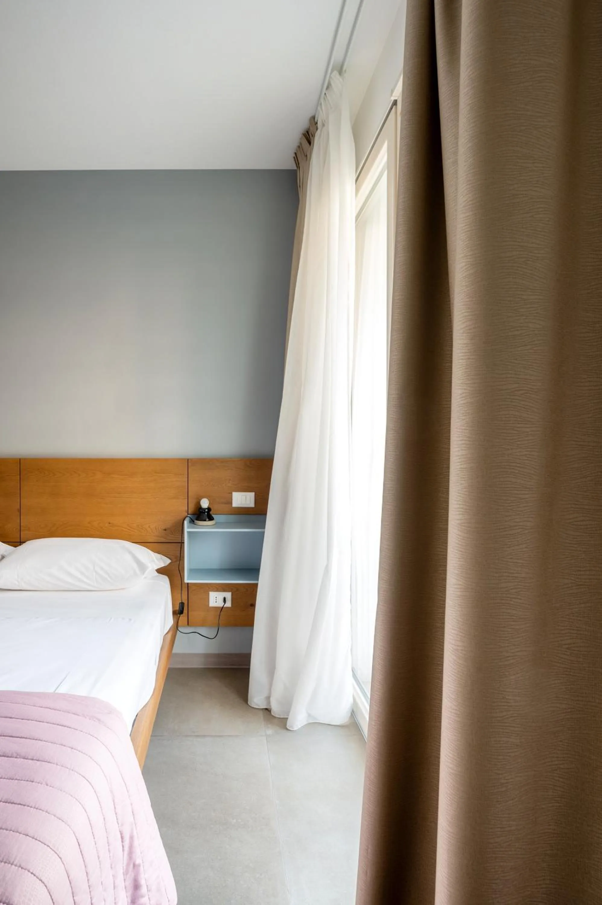 Bed in Serafini Rooms