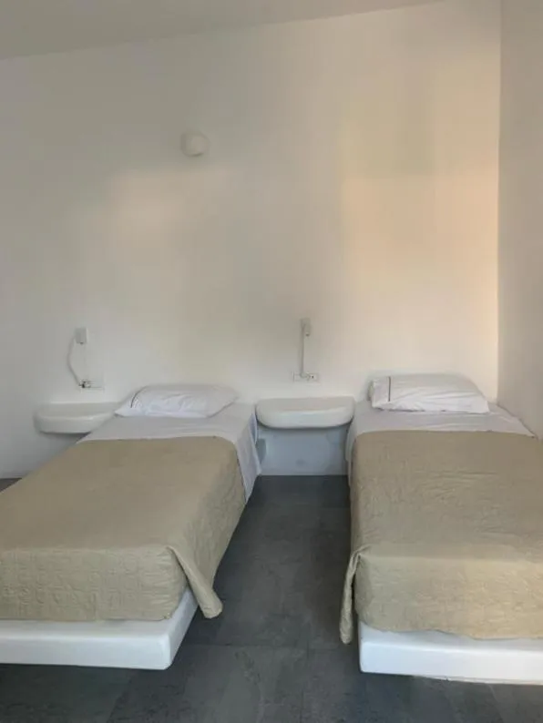 Bed in Petinaros Hotel