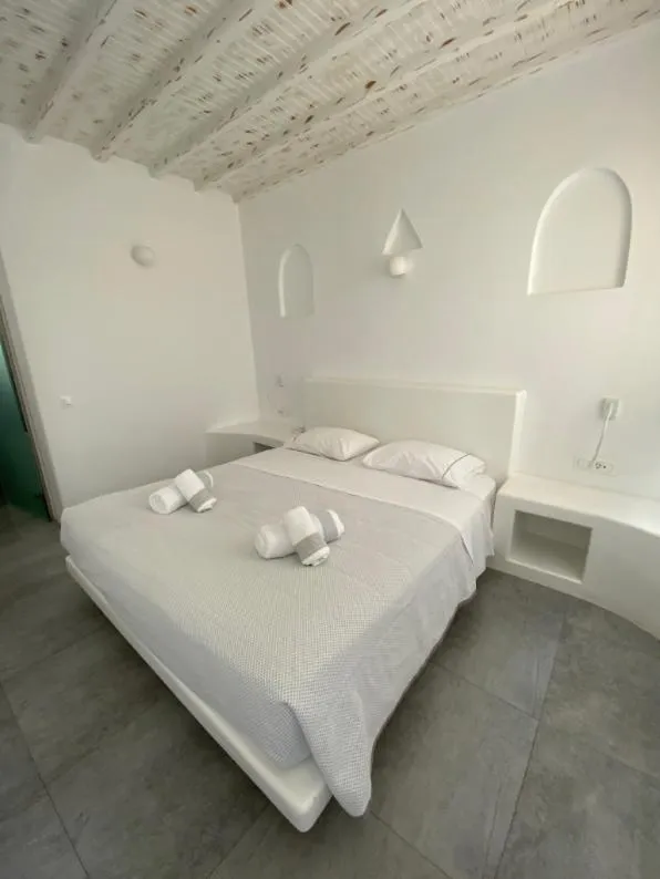 Bed in Petinaros Hotel