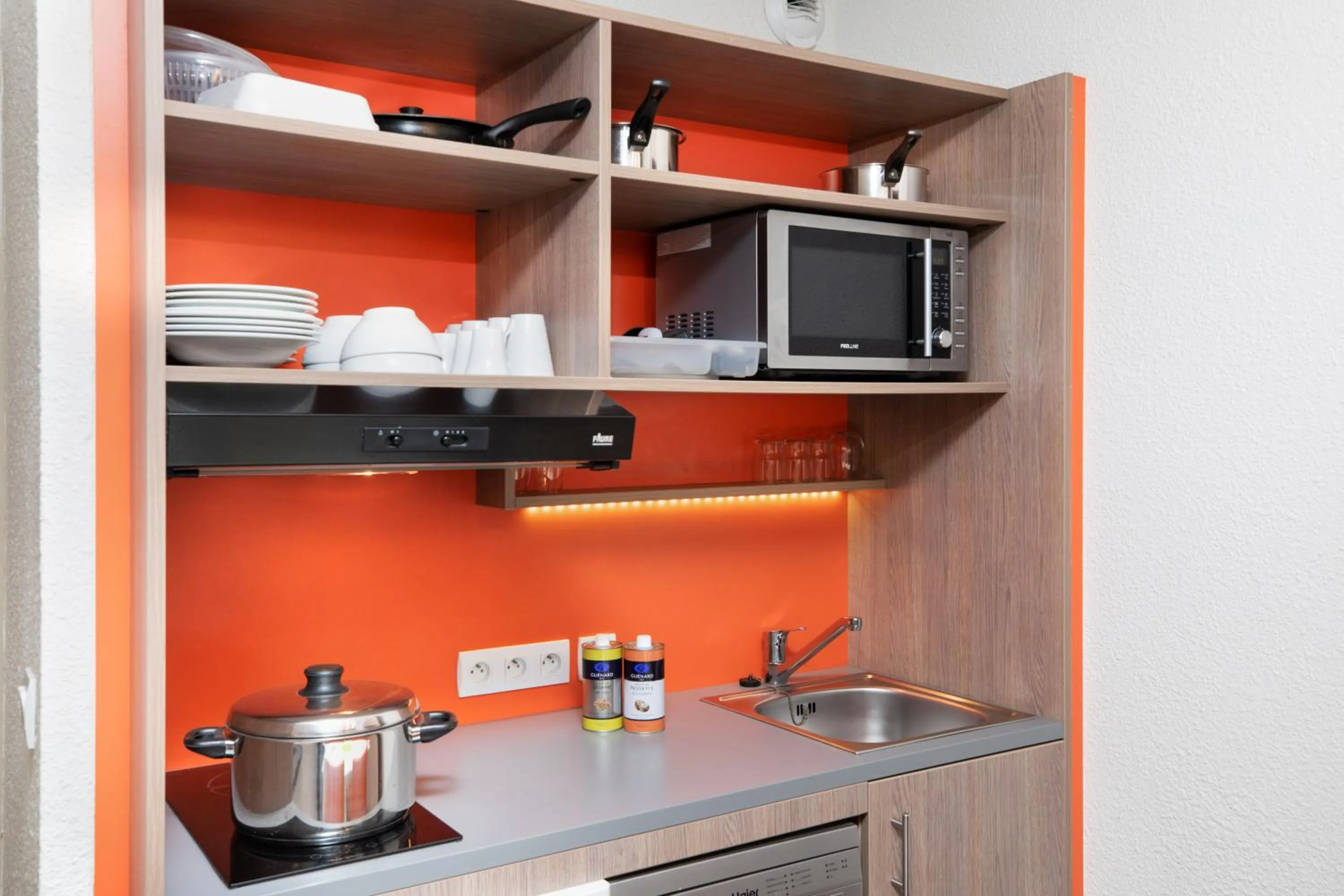 Kitchen or kitchenette in SOWELL Family Pignada Plage