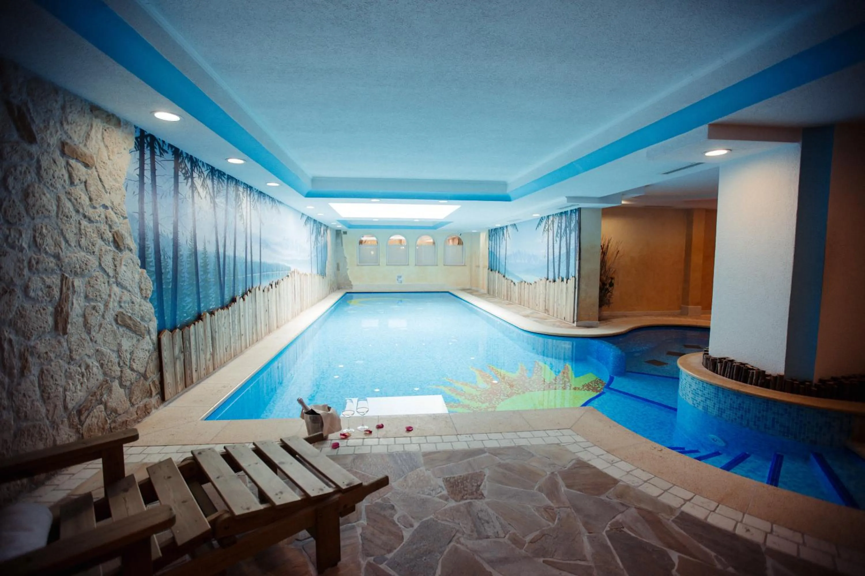 Swimming pool in Albergo Dimaro Wellness Hotel