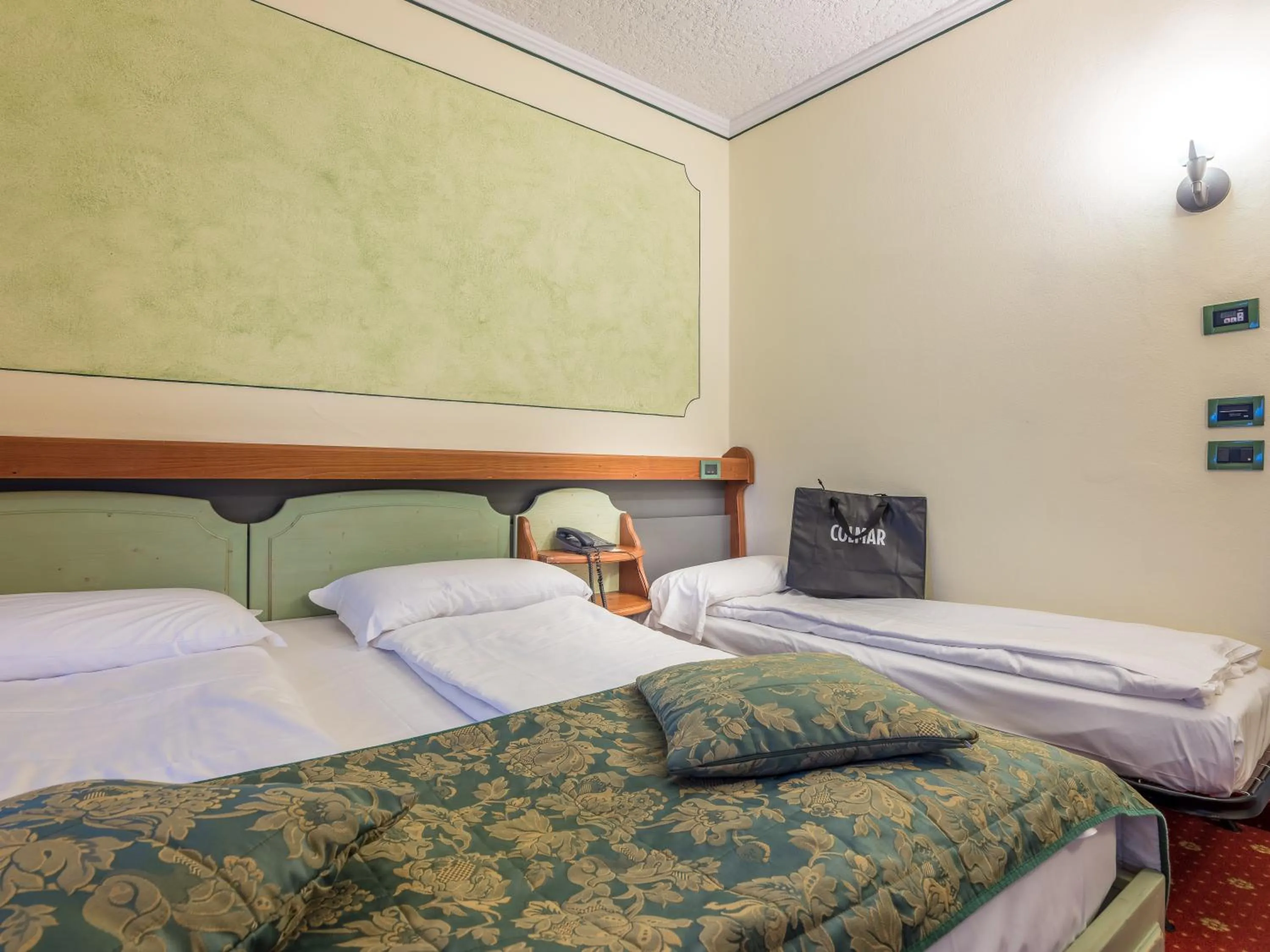 Bedroom, Bed in Albergo Dimaro Wellness Hotel