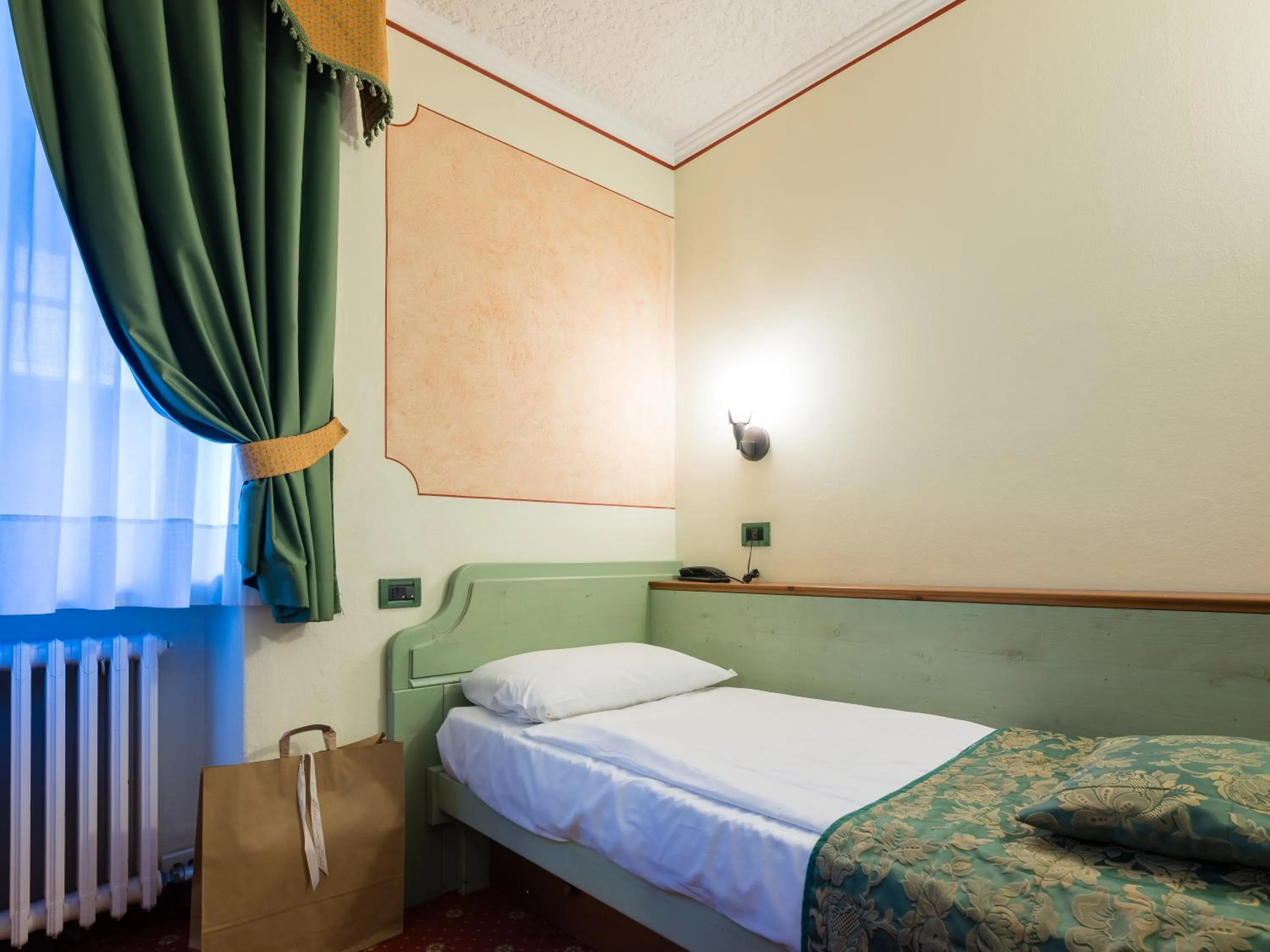 Bedroom, Bed in Albergo Dimaro Wellness Hotel