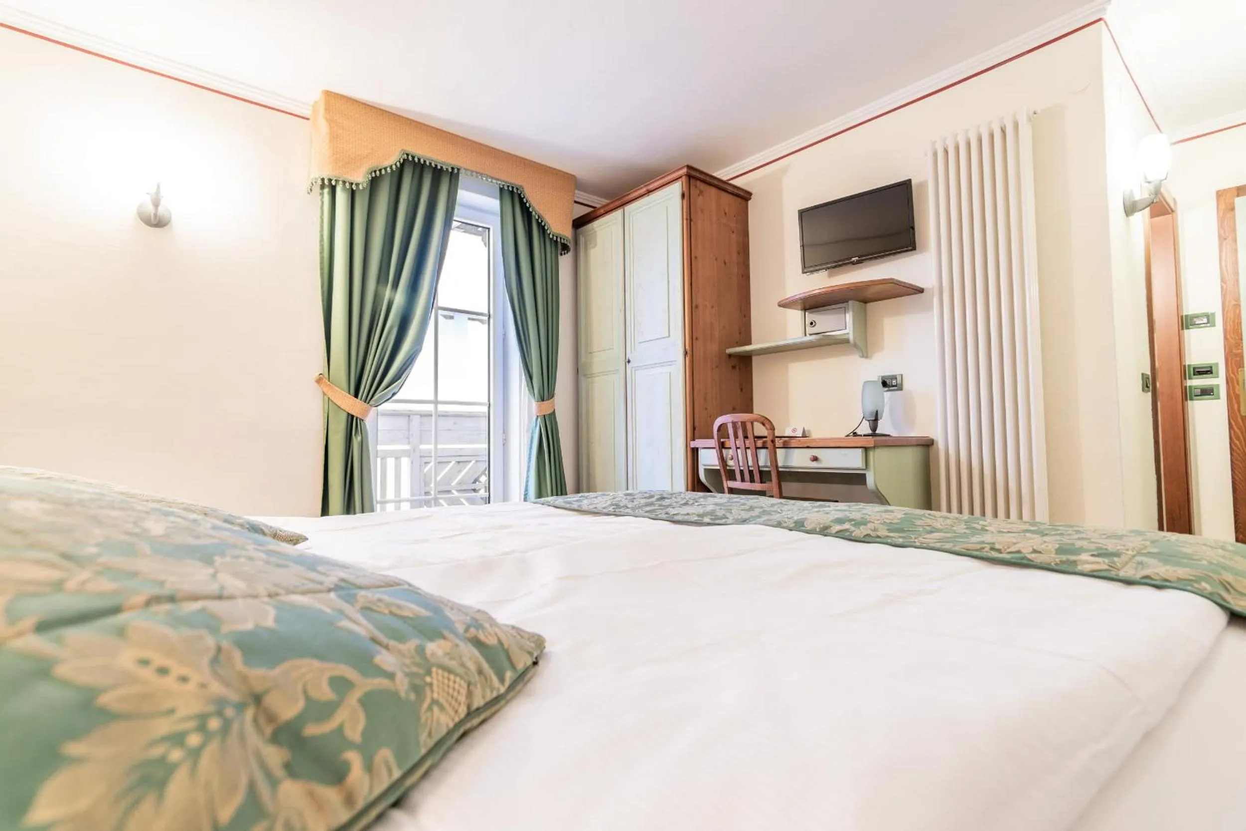 Photo of the whole room, Bed in Albergo Dimaro Wellness Hotel