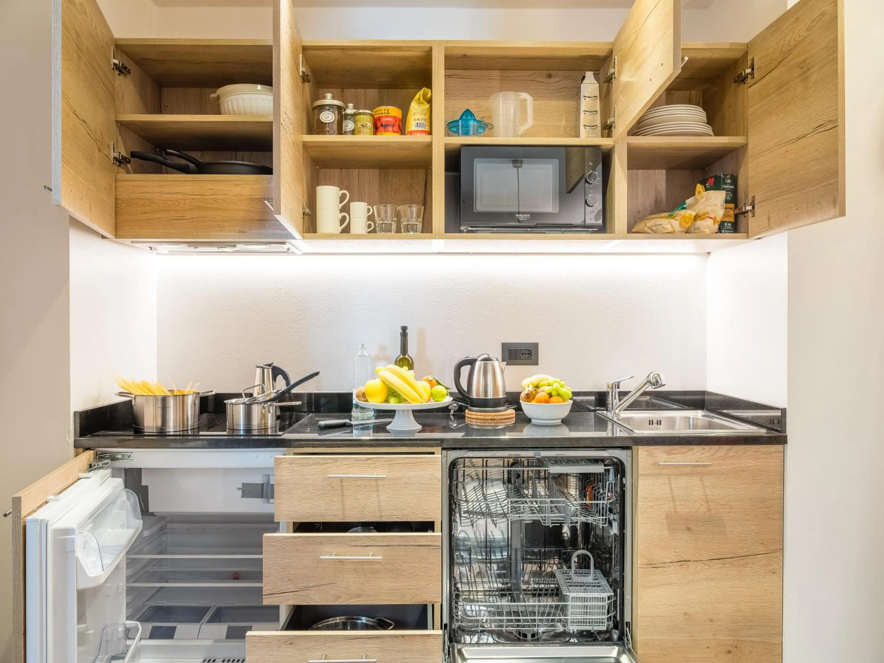 Kitchen or kitchenette in Albergo Dimaro Wellness Hotel