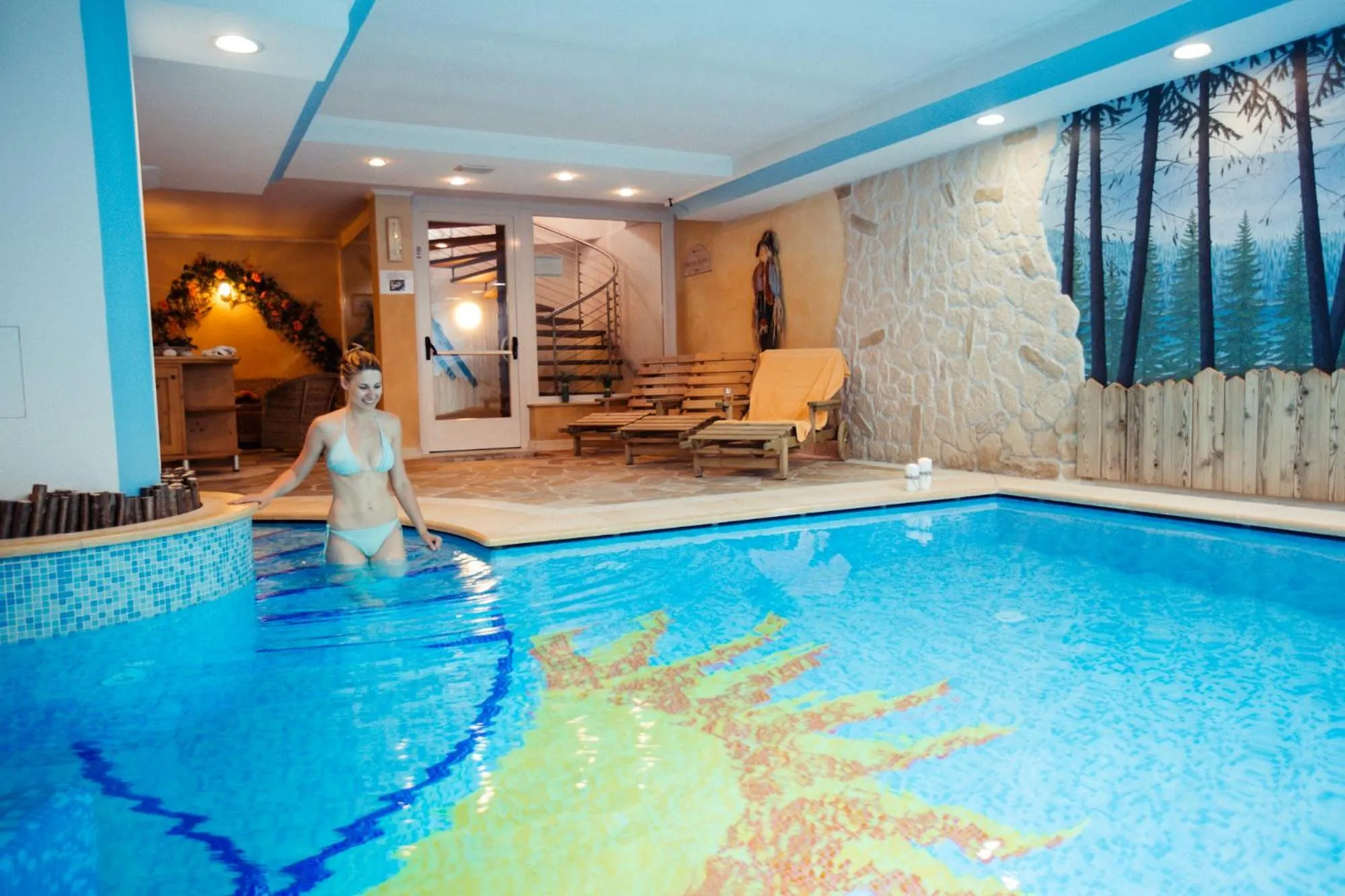 Swimming pool in Albergo Dimaro Wellness Hotel