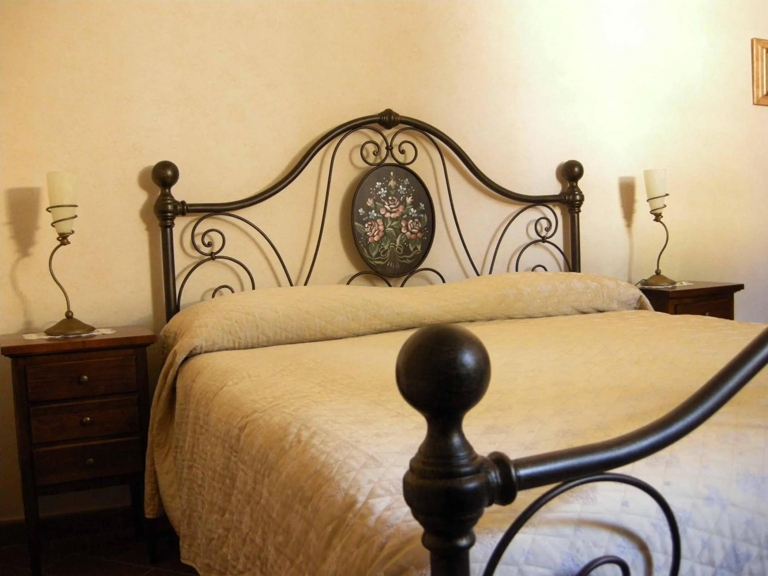 Bed in Relais Villa Sensano