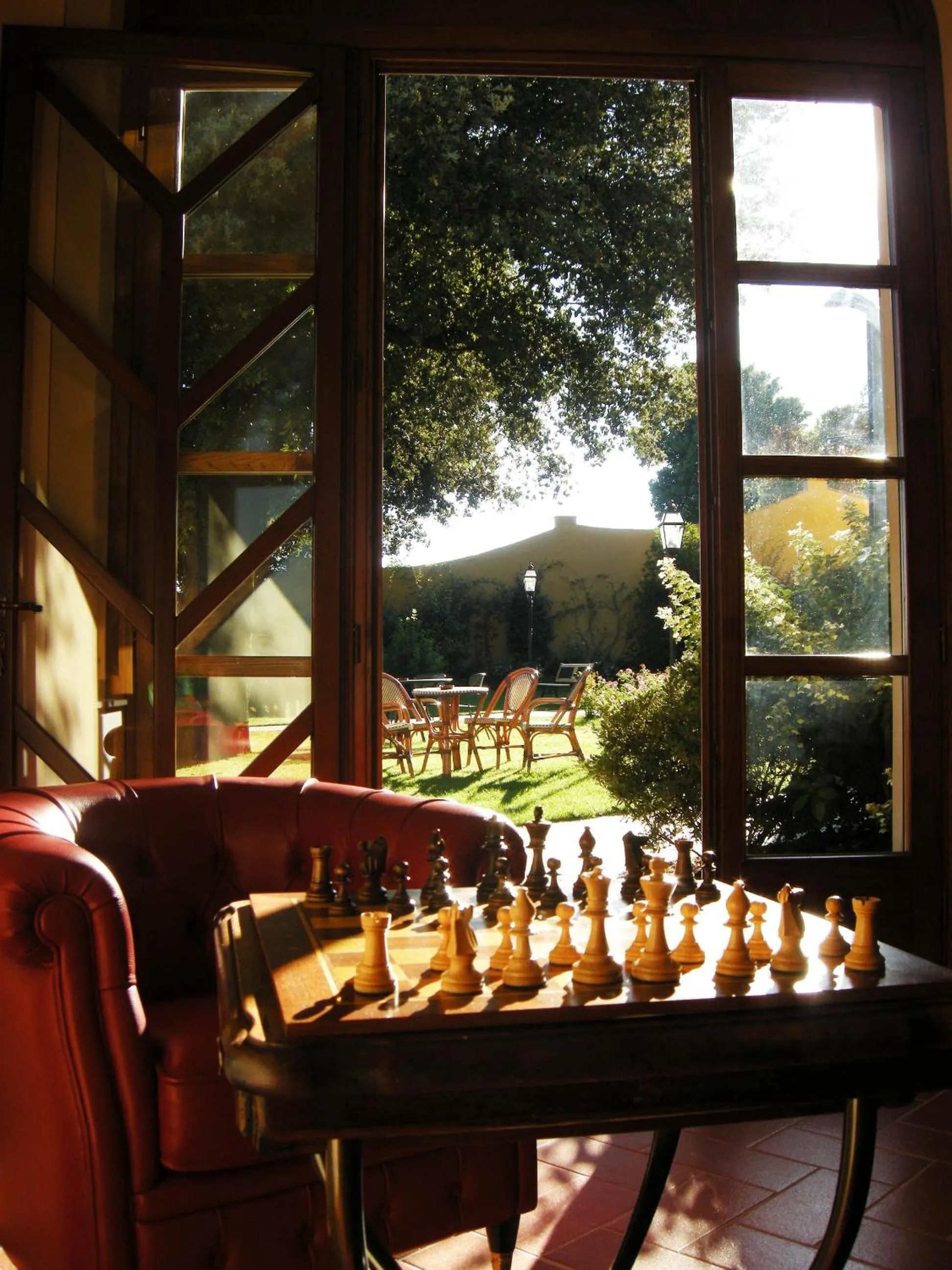 Communal lounge/ TV room in Relais Villa Sensano