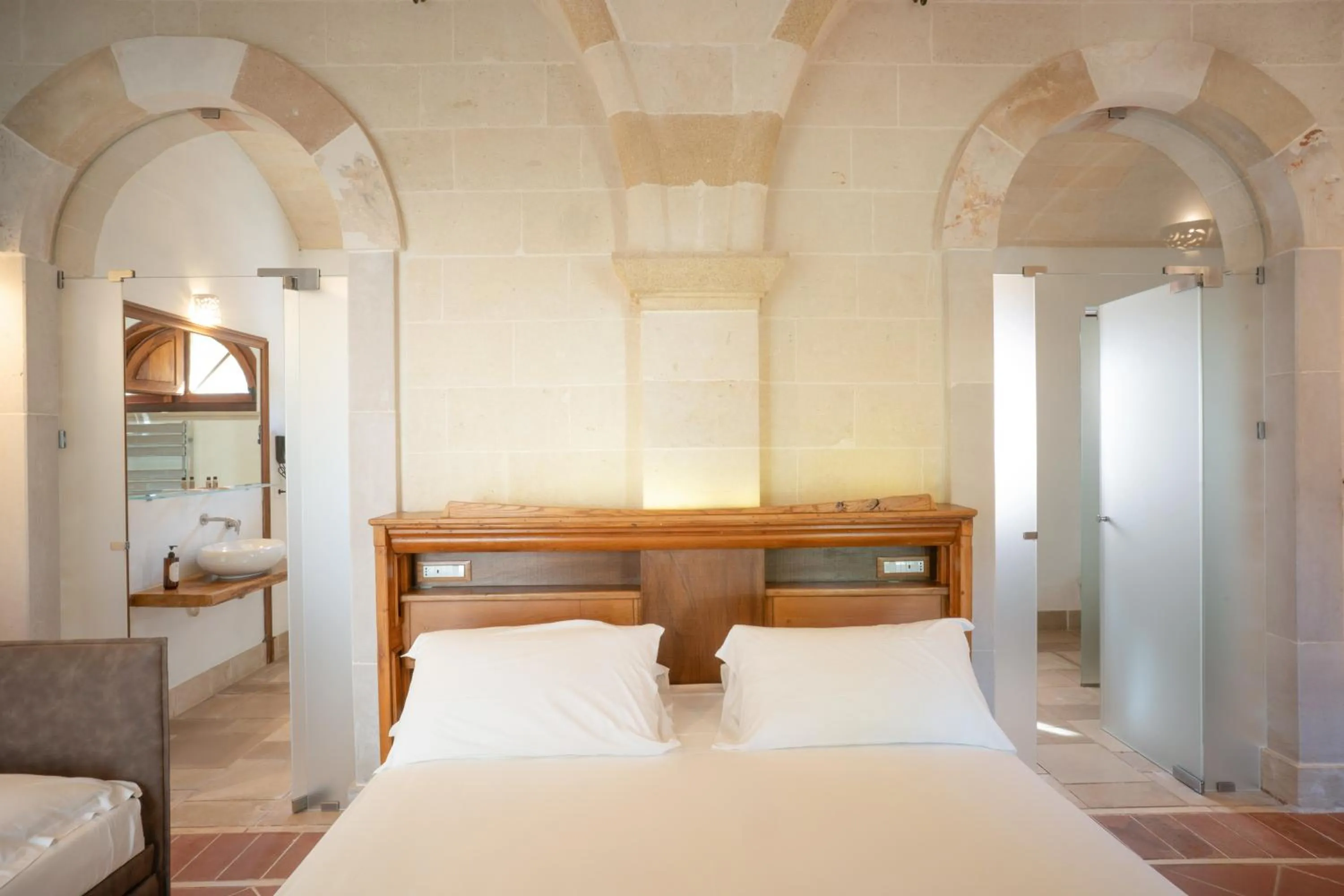 Bed in Masseria Le Lamie