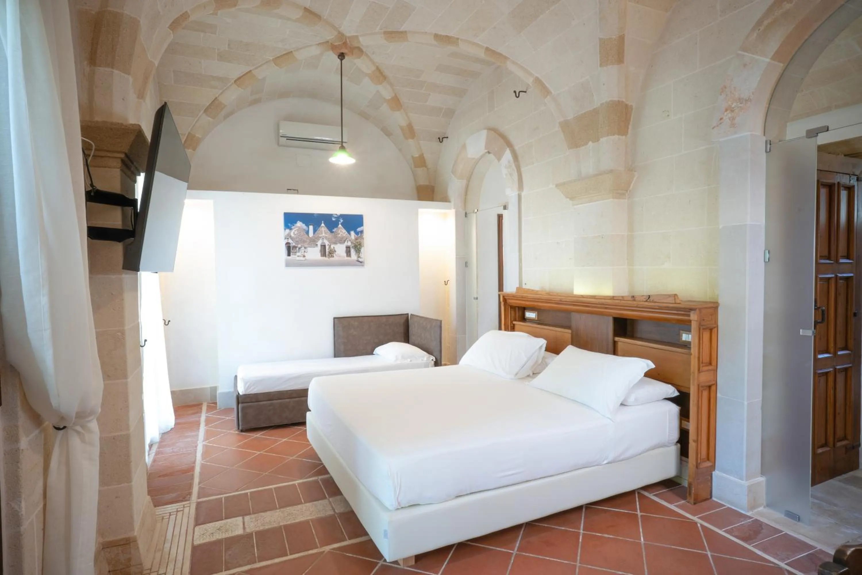Bed in Masseria Le Lamie