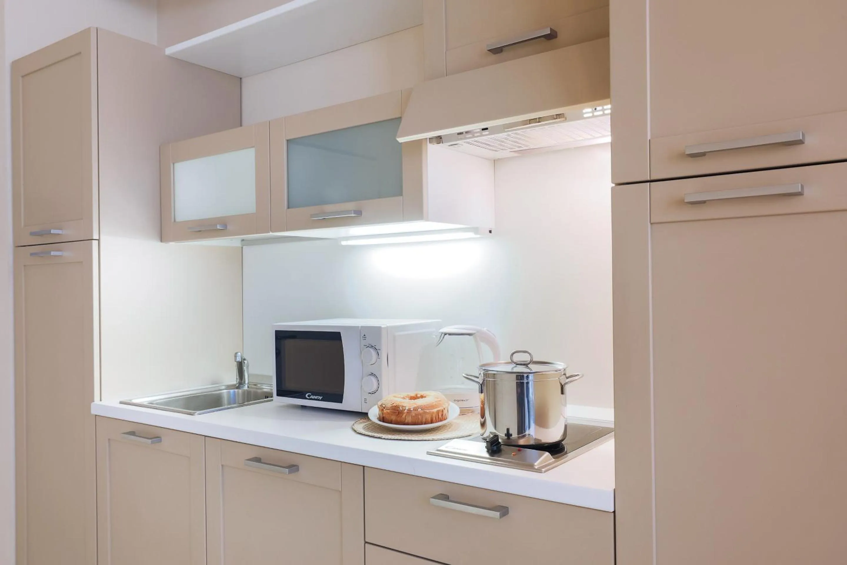 Kitchen or kitchenette in Adriano Residence