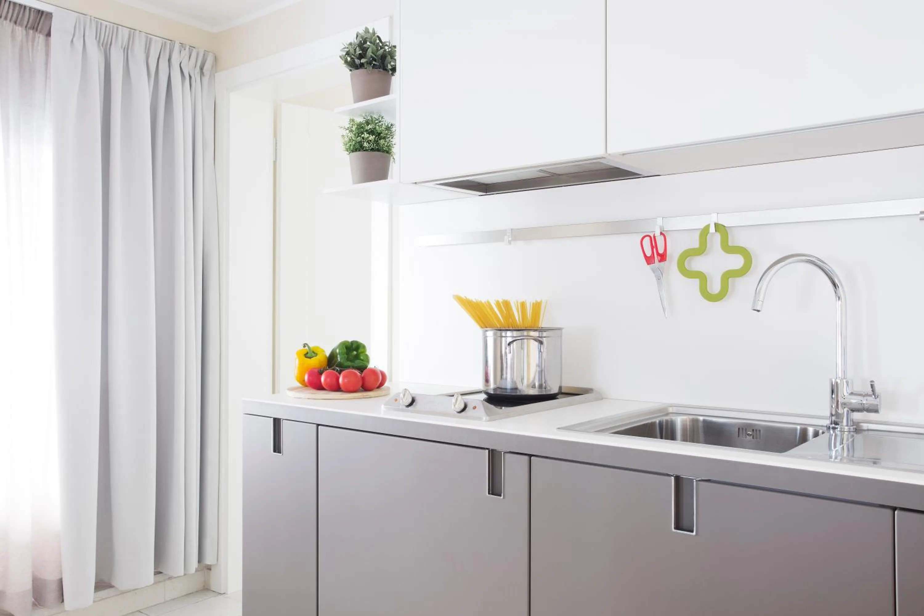 Kitchen or kitchenette in Adriano Residence