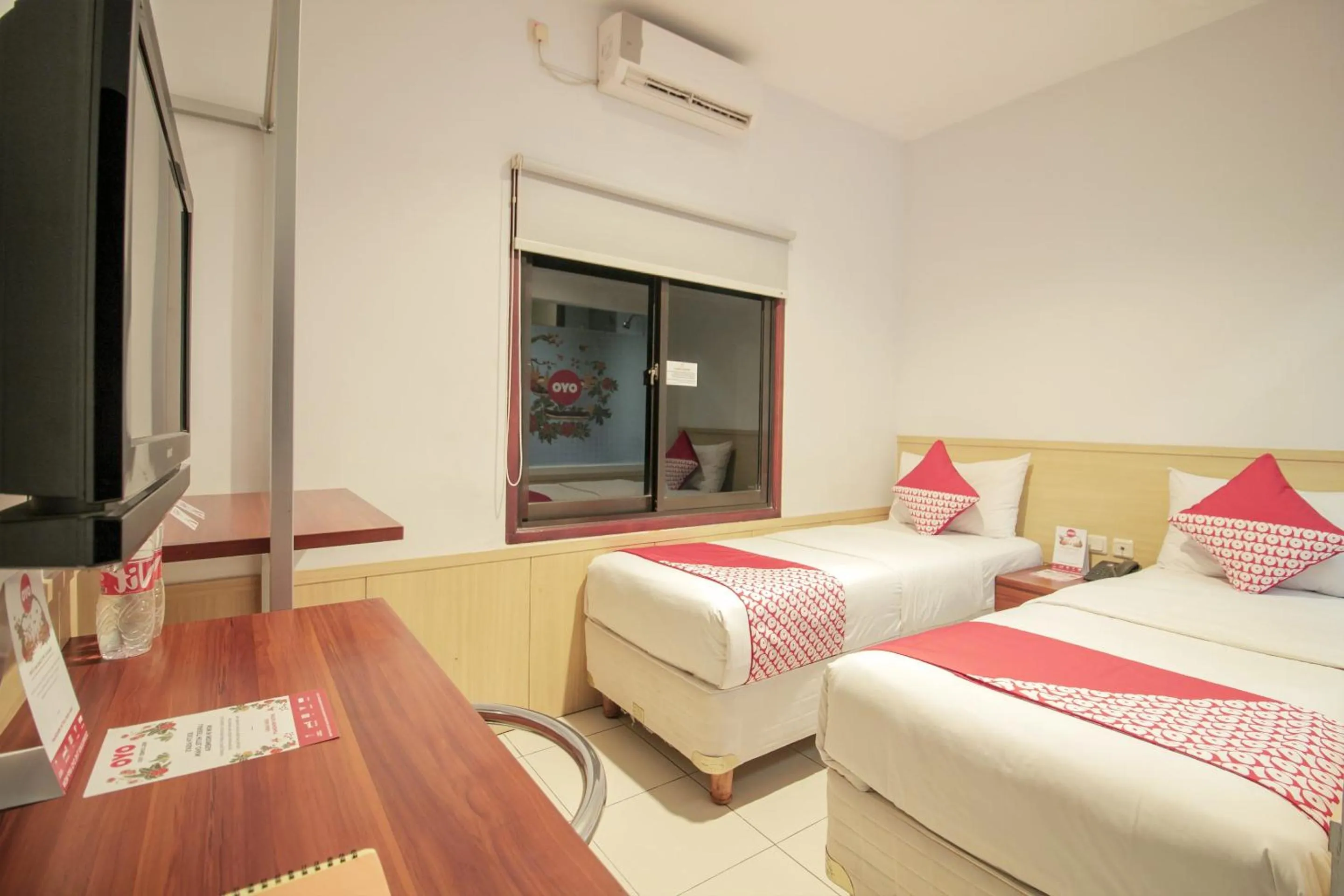 Bedroom in Collection O 295 Grha Ciumbuleuit Guest House