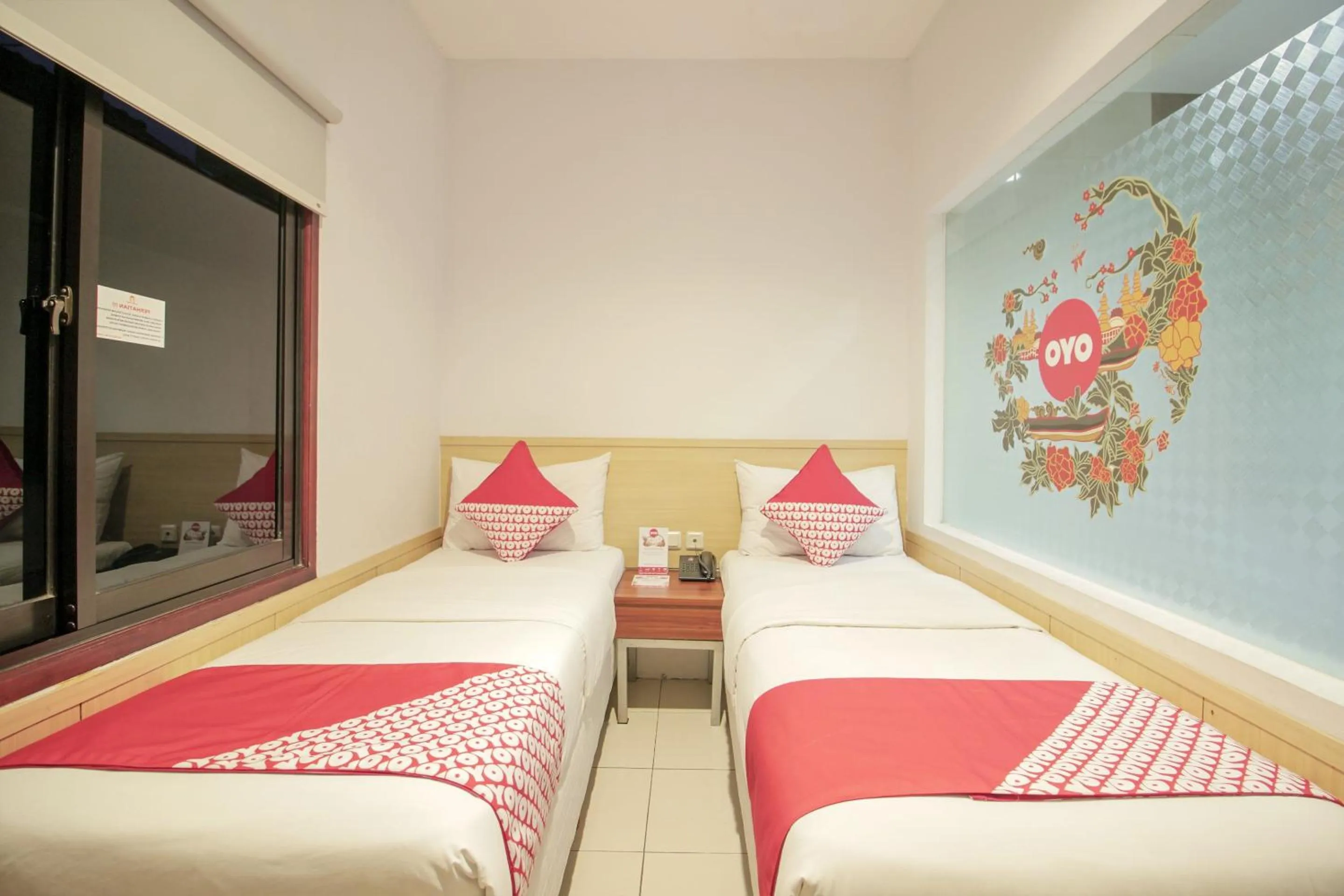 Bedroom in Collection O 295 Grha Ciumbuleuit Guest House