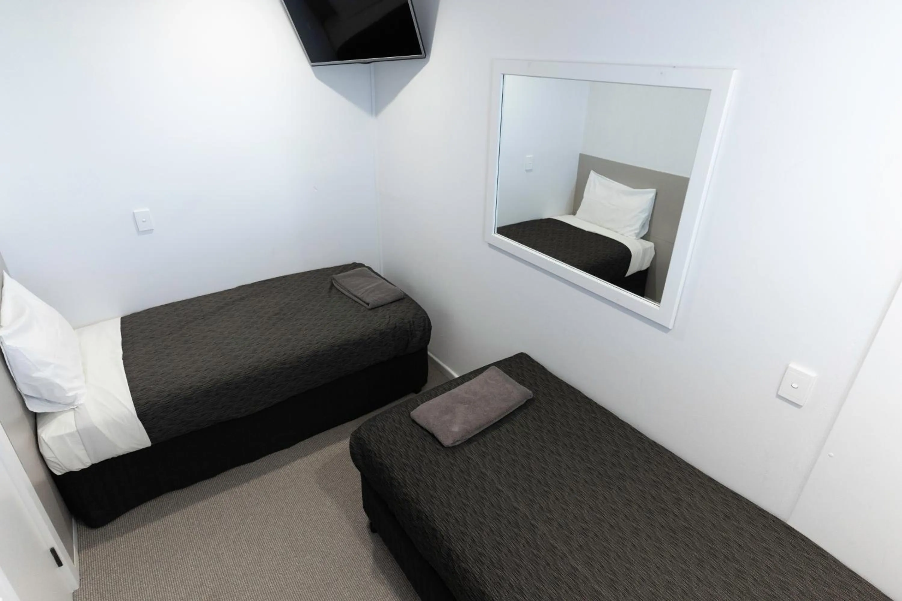 Bed in Amooran Oceanside Apartments and Motel