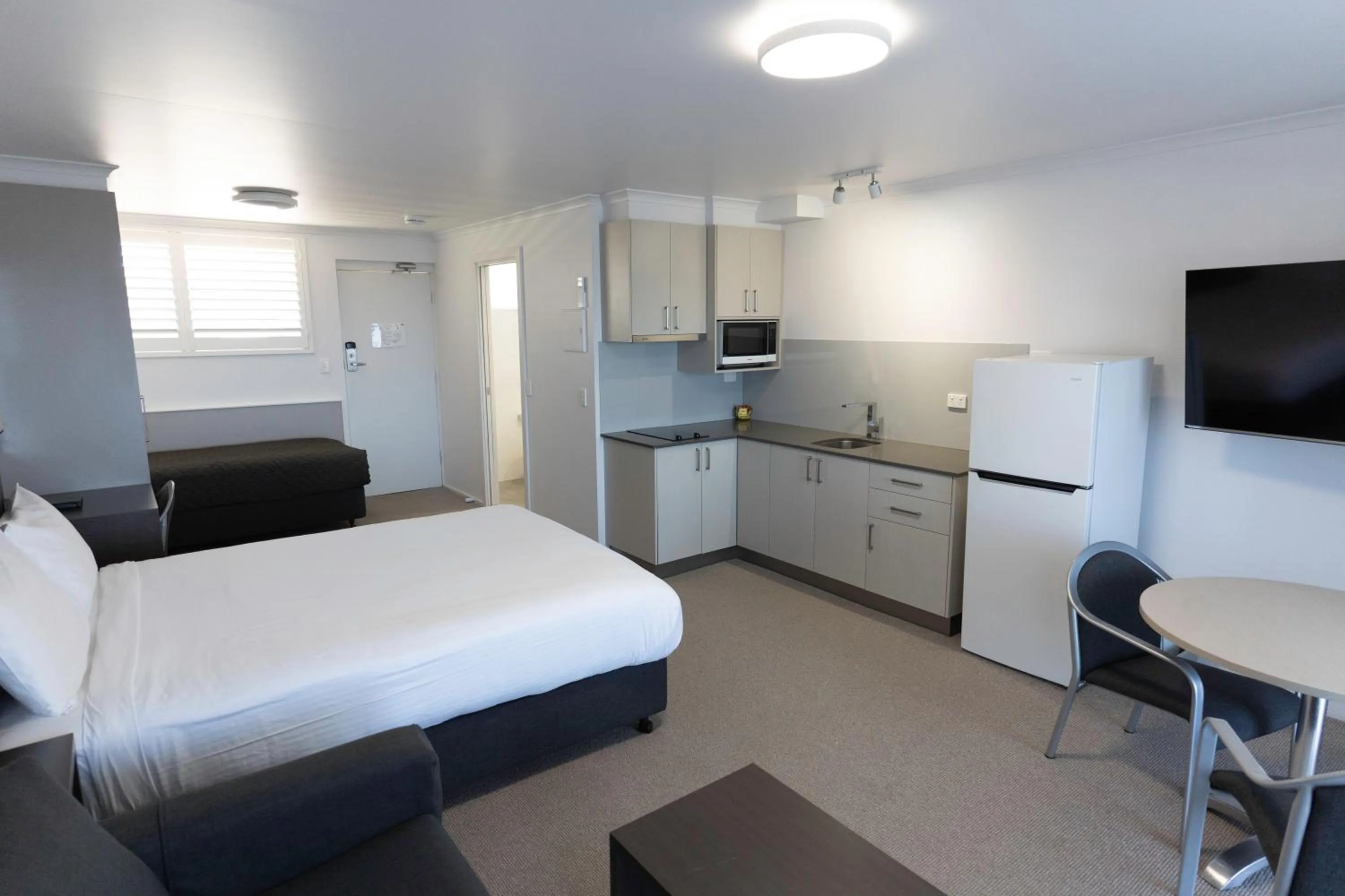 Bed in Amooran Oceanside Apartments and Motel