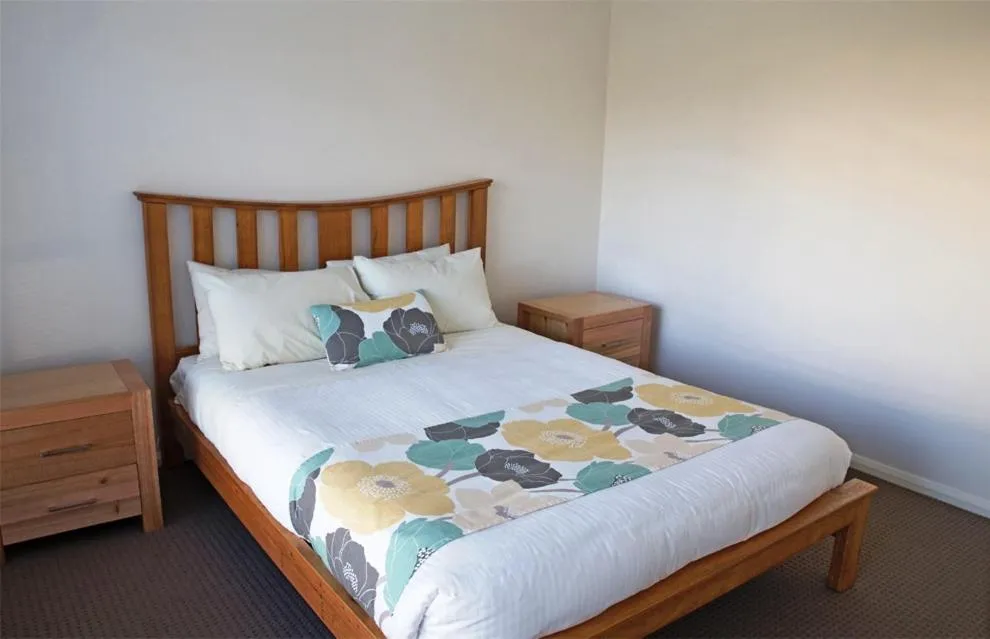 Bed in Amooran Oceanside Apartments and Motel