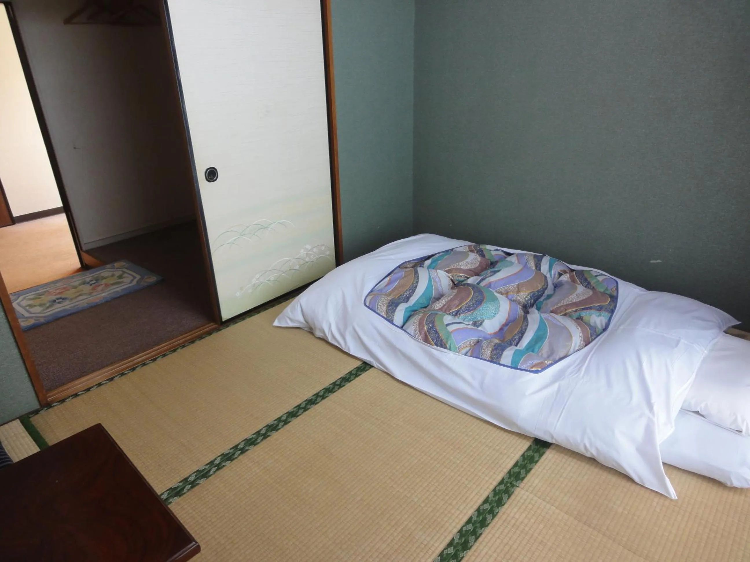Bed in Hotel Sankyu