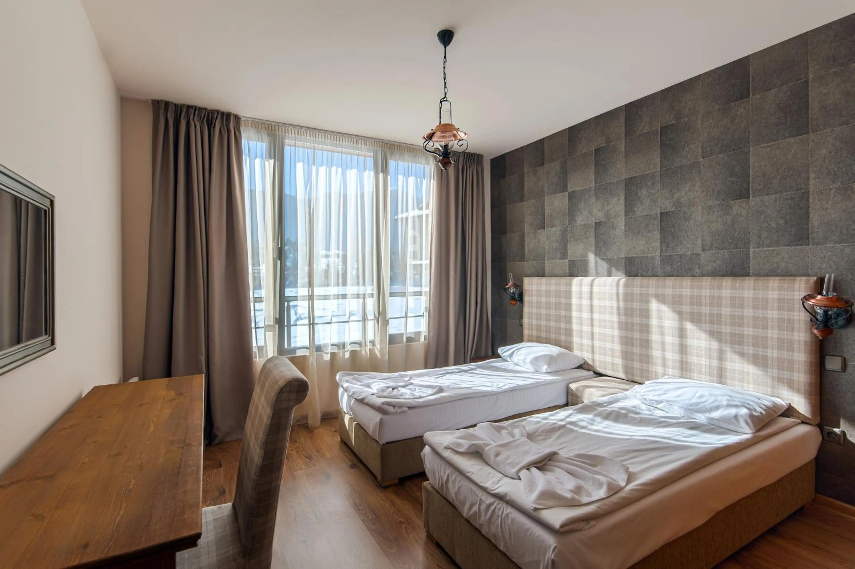 Bed in Cornelia Deluxe Residence