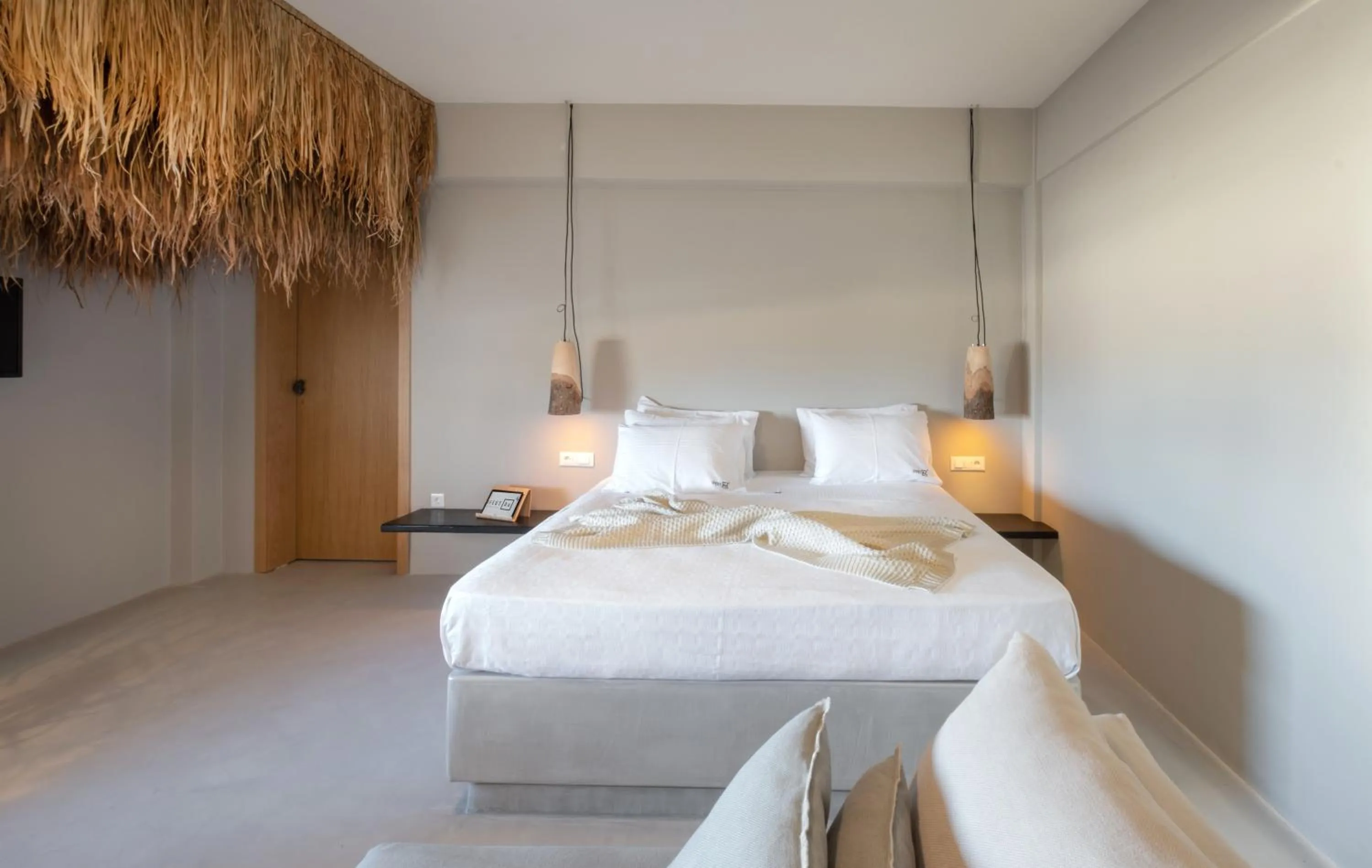 Bed in IfestAu.4 Suites