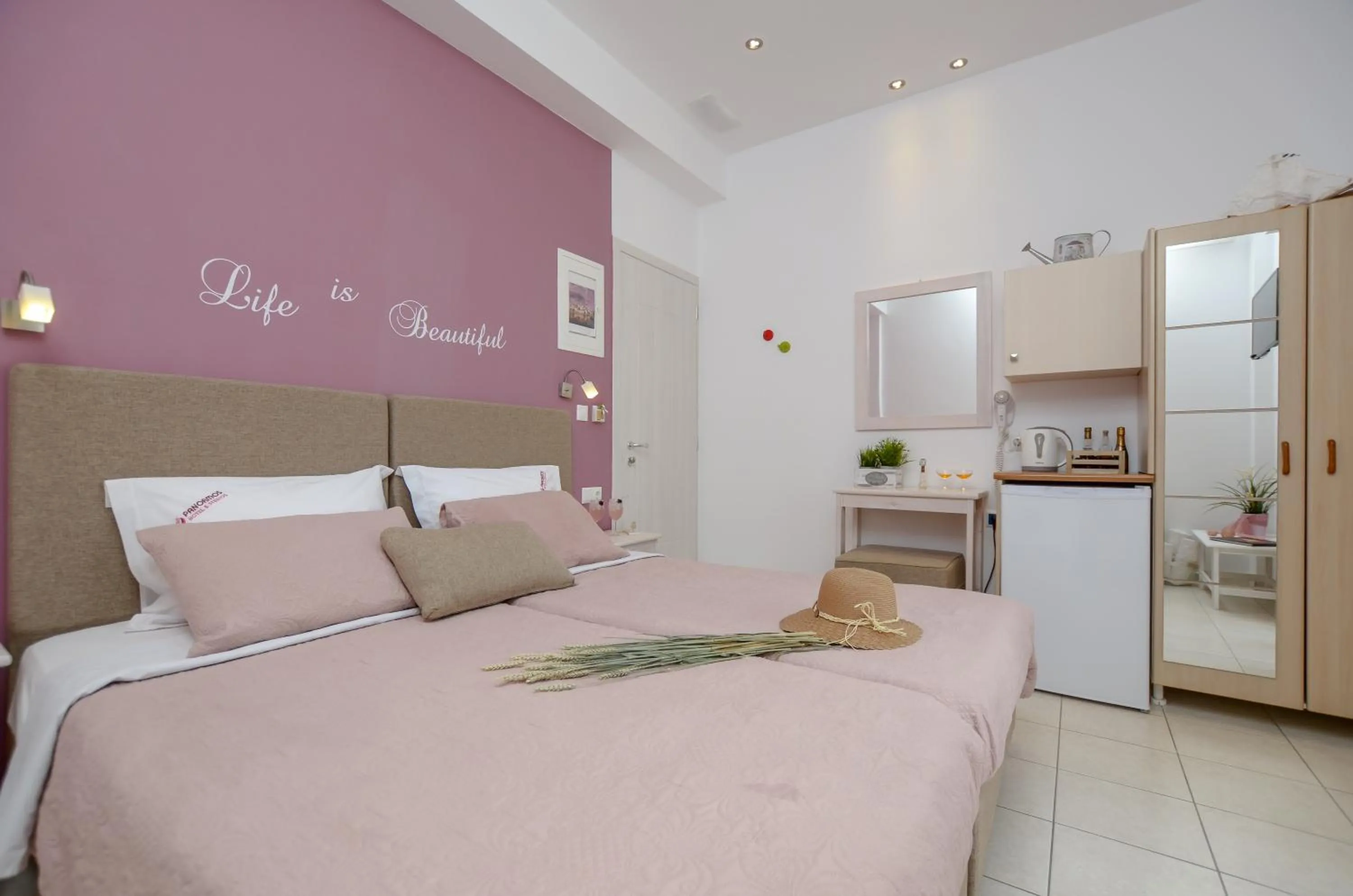 Bed in Panormos Hotel and Studios