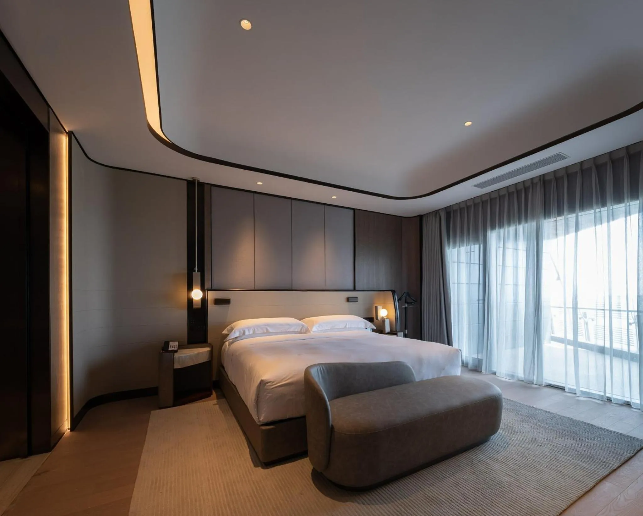 Photo of the whole room, Bed in InterContinental Shanghai Harbour City by IHG