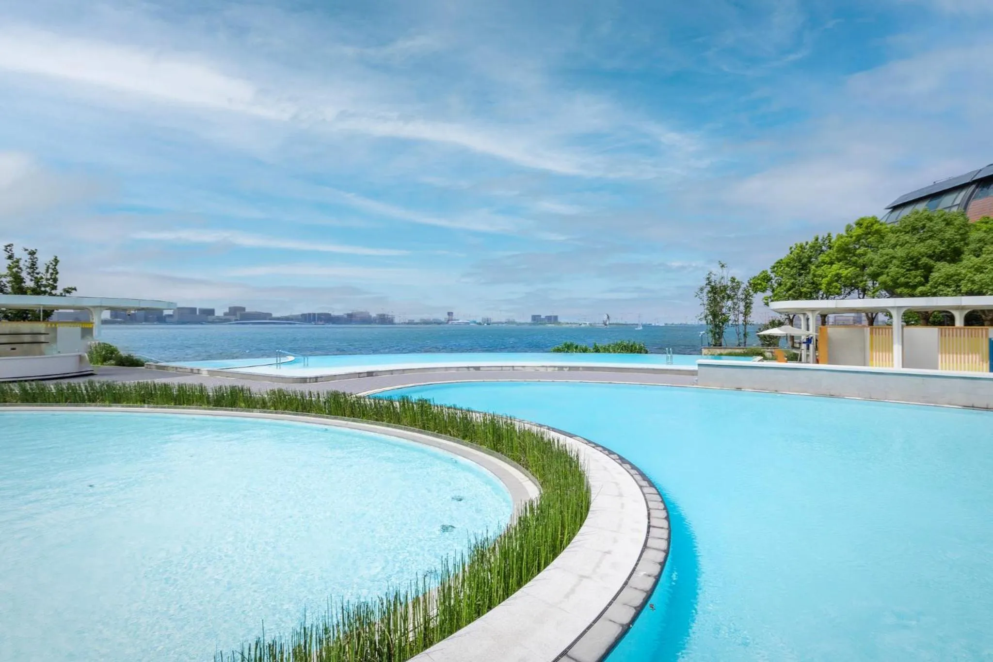 Swimming pool in InterContinental Shanghai Harbour City by IHG