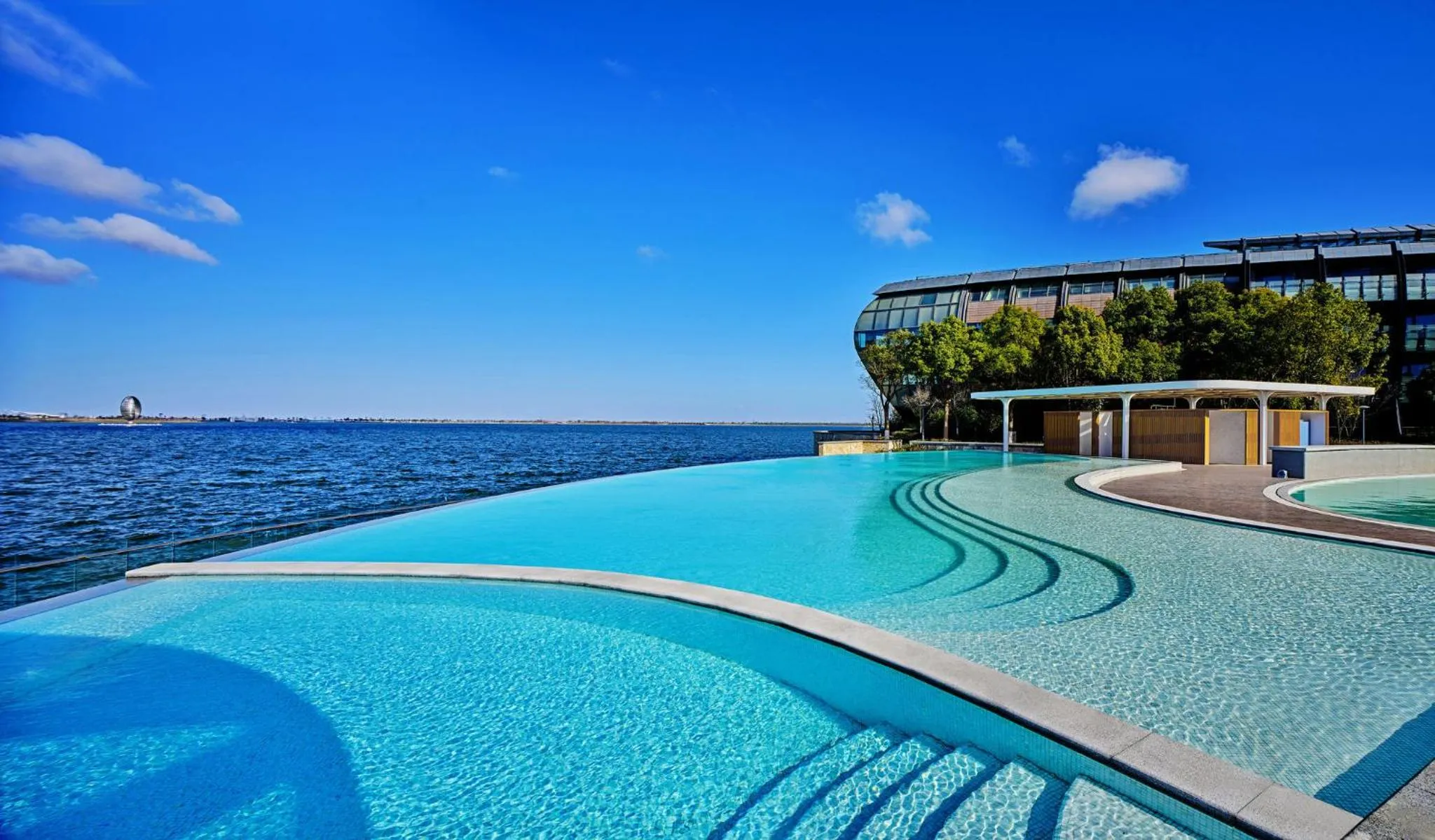 Swimming pool in InterContinental Shanghai Harbour City by IHG