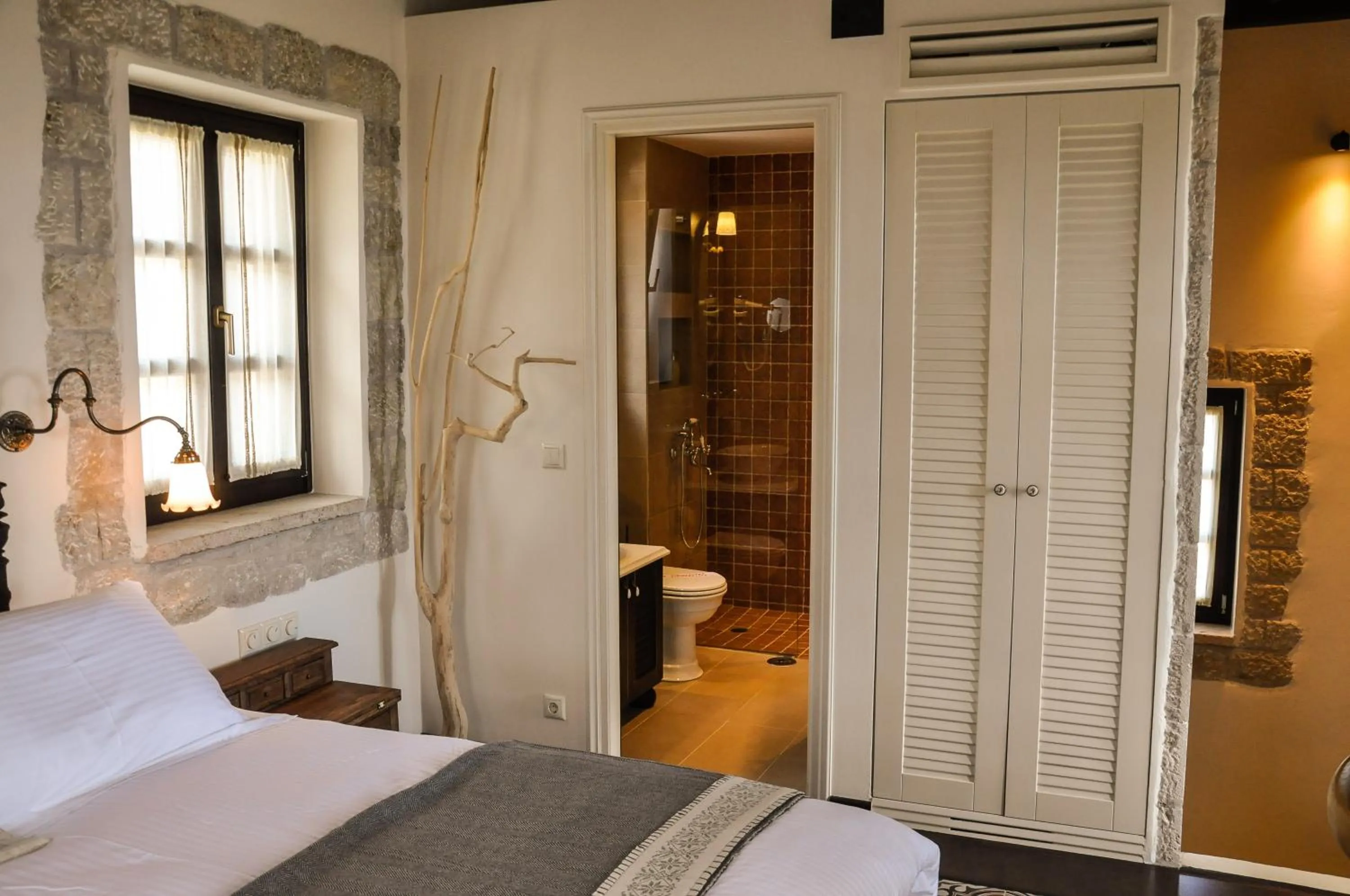 Bathroom, Bed in Polismata - Private Residences