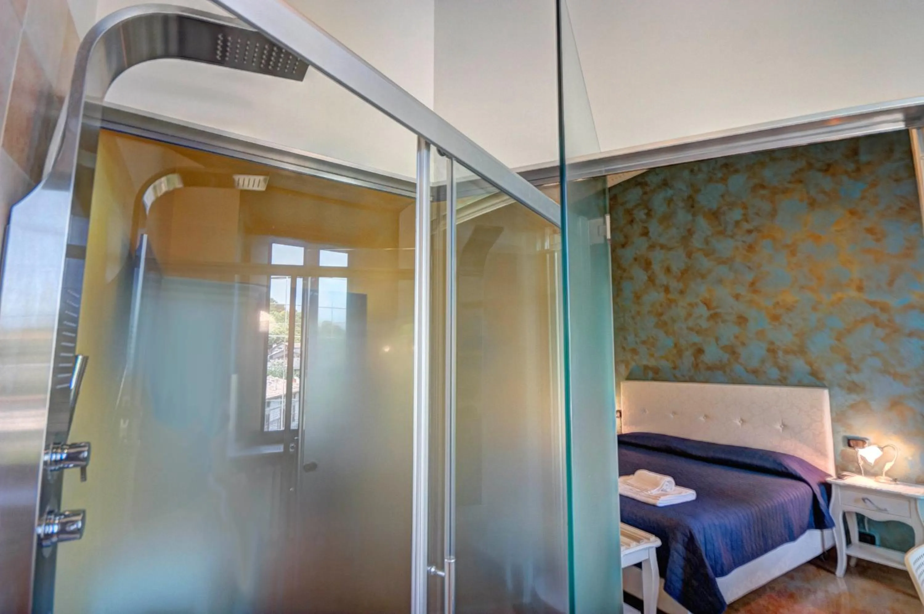 Bathroom, Bed in Raffaello Residence