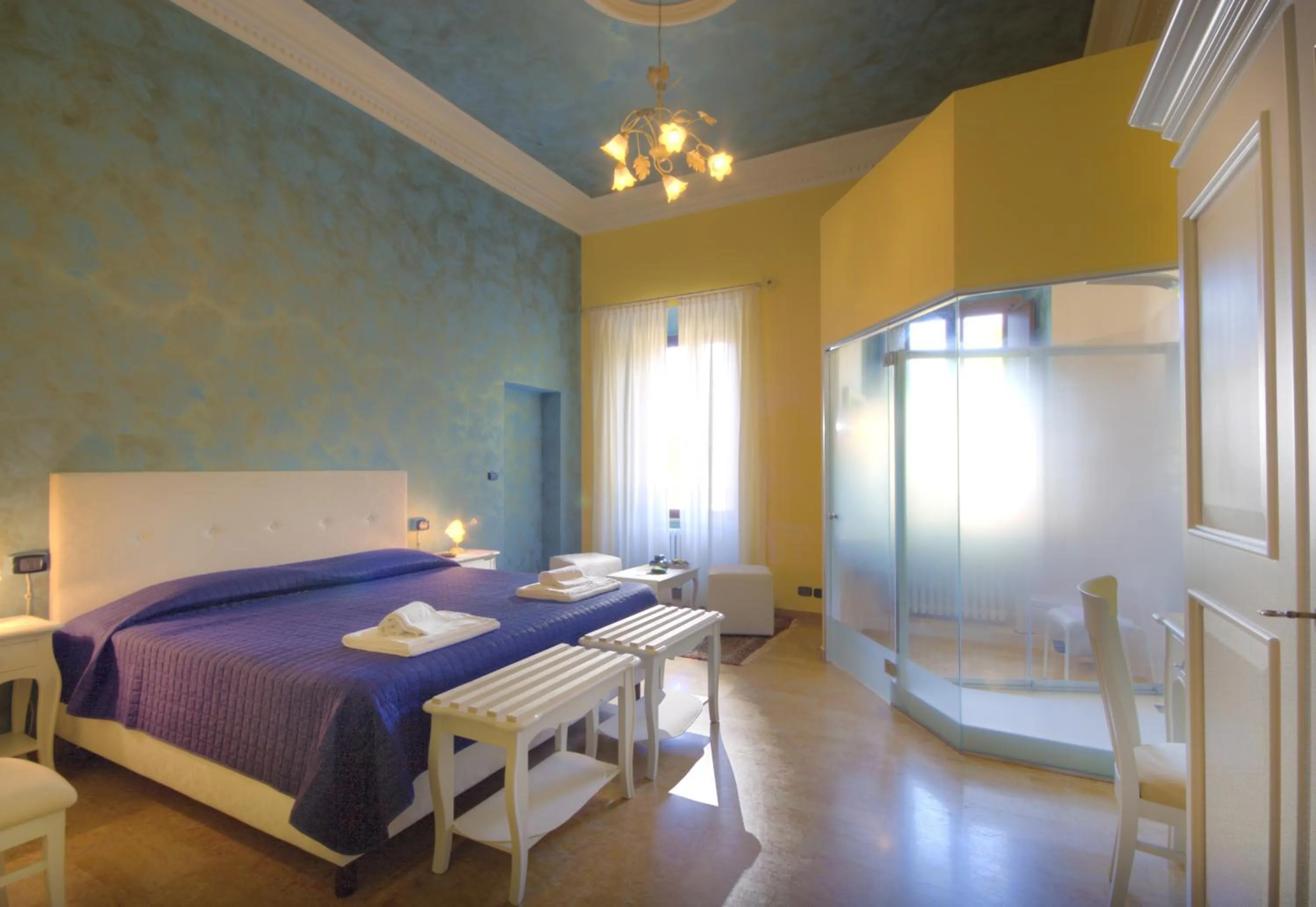 Photo of the whole room, Bed in Raffaello Residence