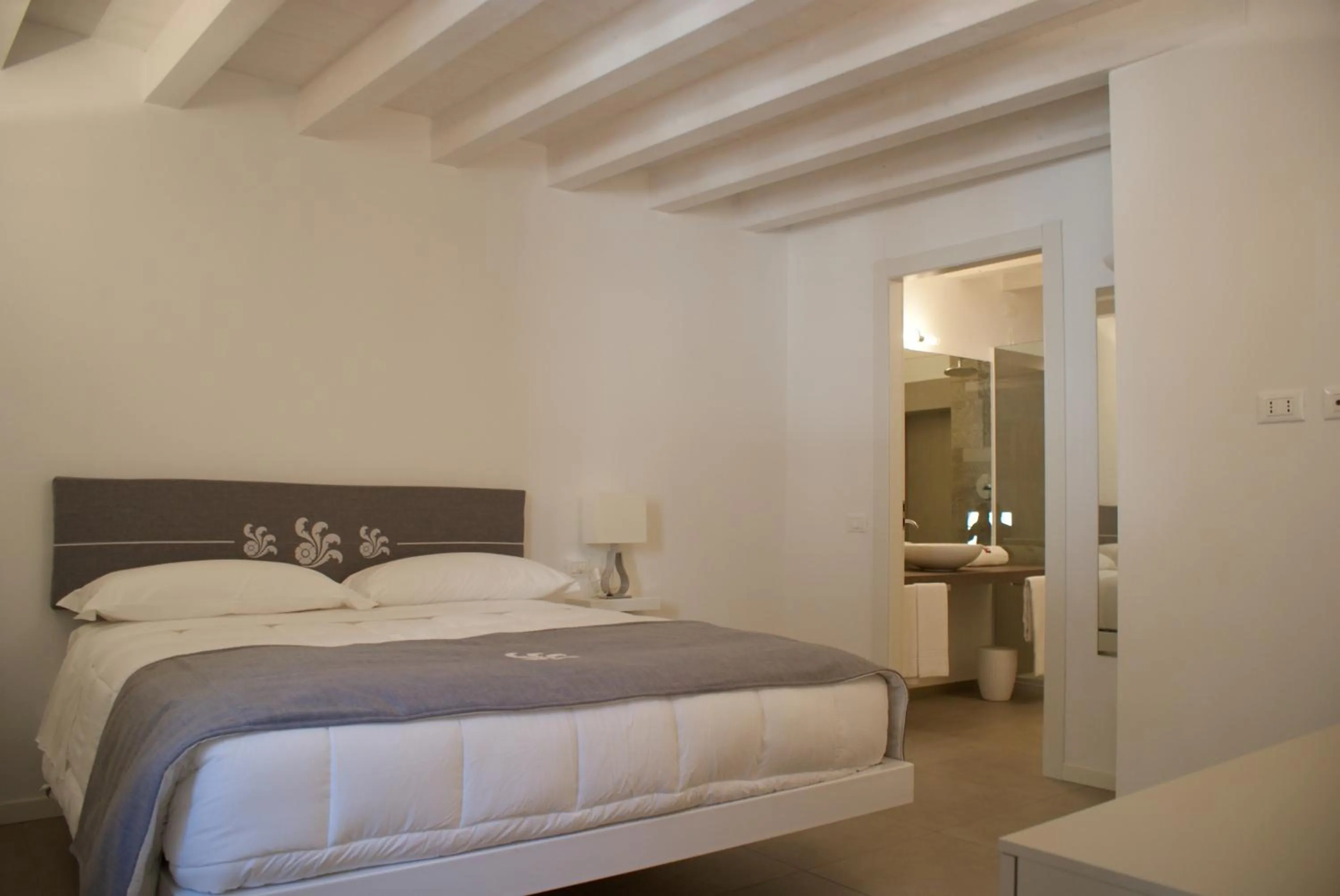 Photo of the whole room, Bed in Albergo Diffuso Vulcano Village