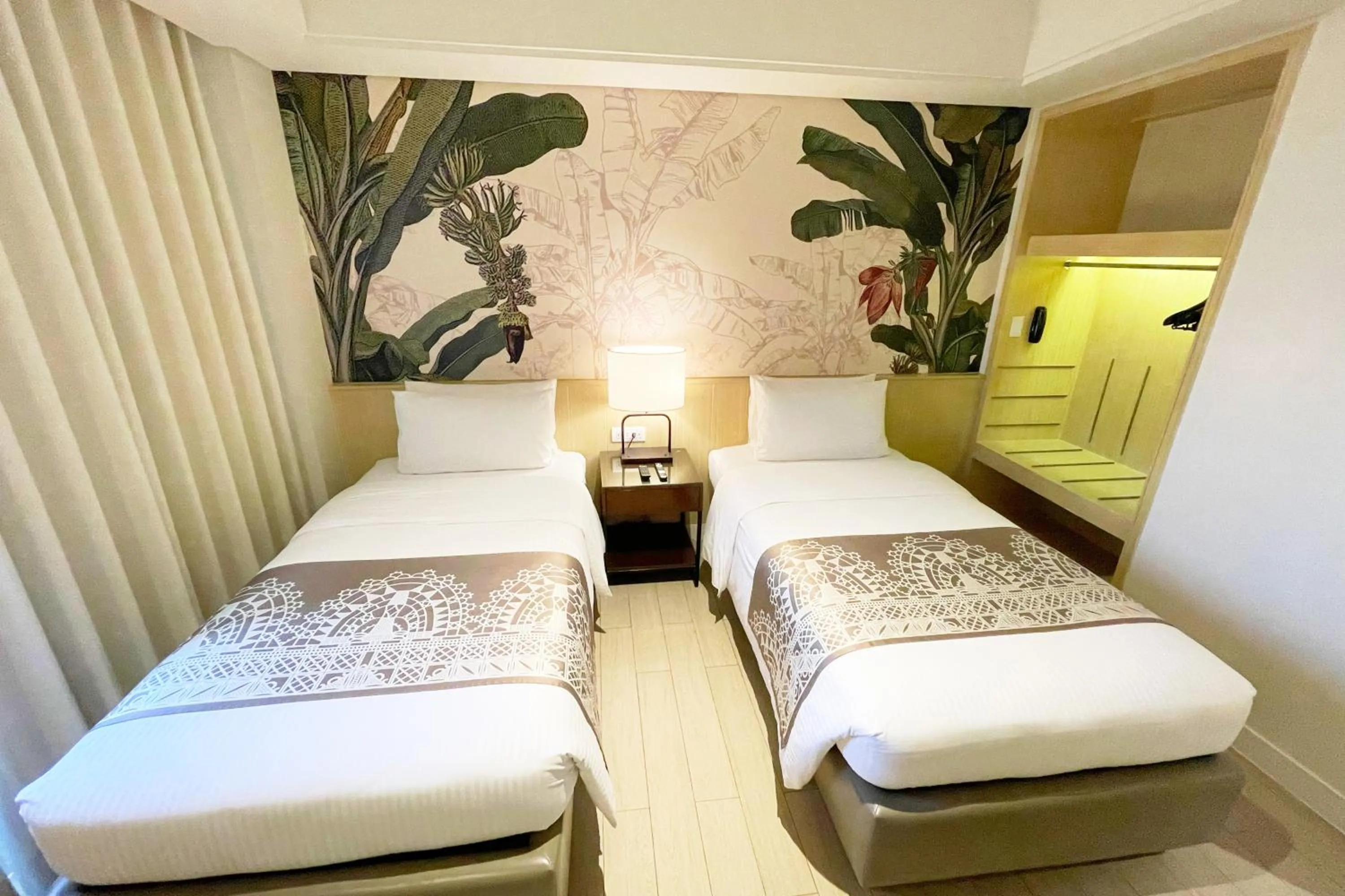 Bed in Mella Hotel Manila near NAIA Airport