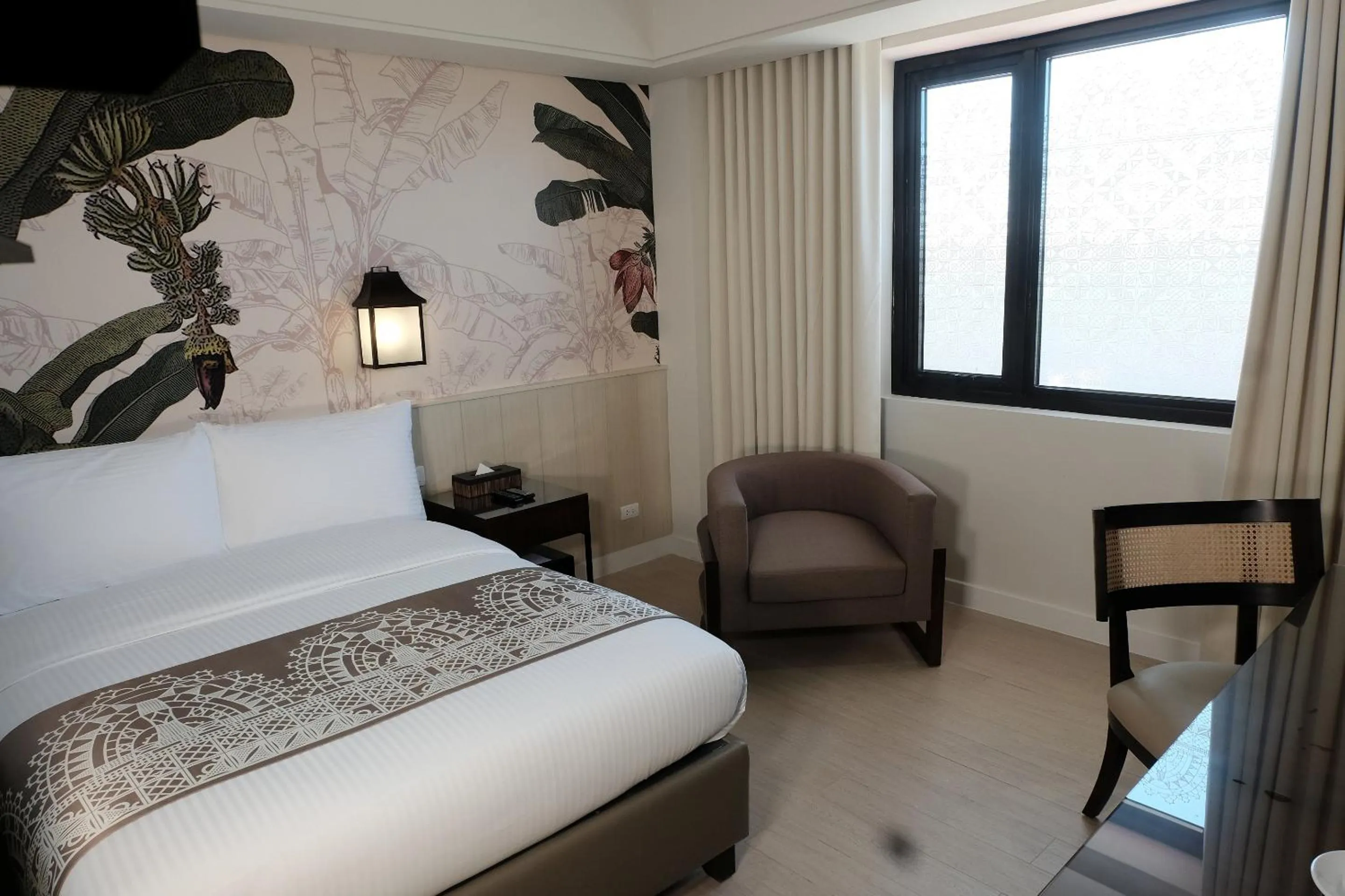 Bed in Mella Hotel Manila near NAIA Airport