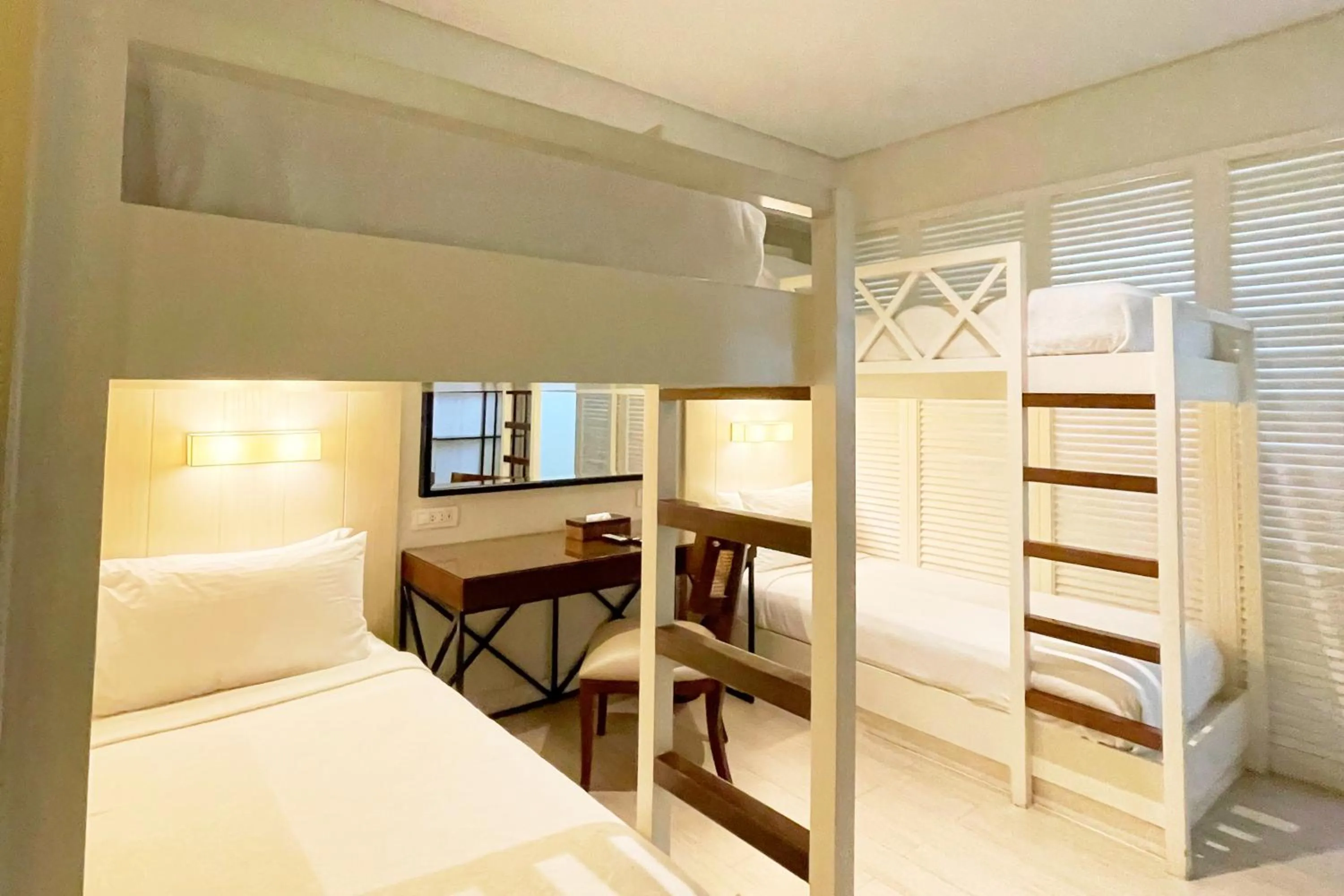 Bed in Mella Hotel Manila near NAIA Airport