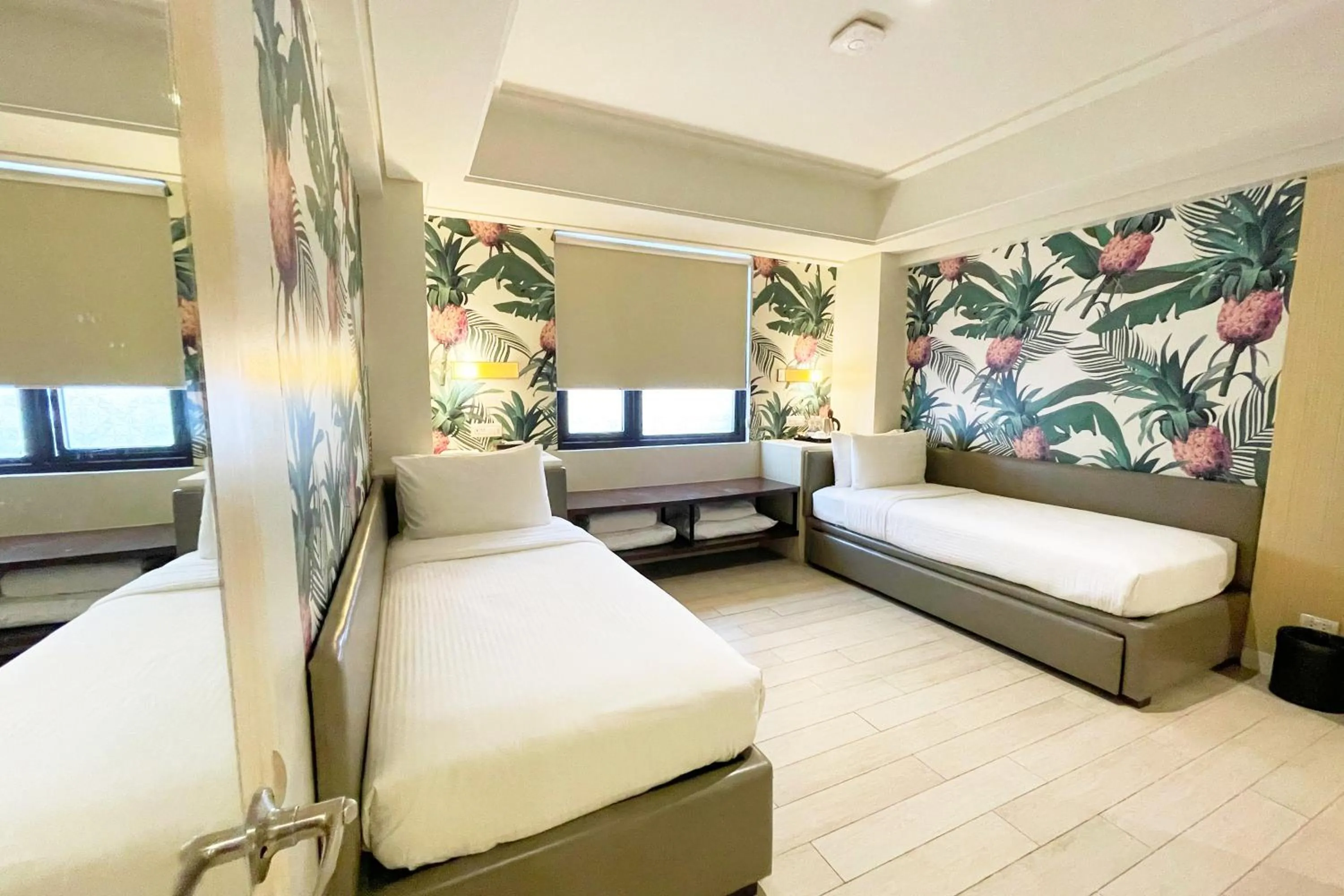 Bed in Mella Hotel Manila near NAIA Airport