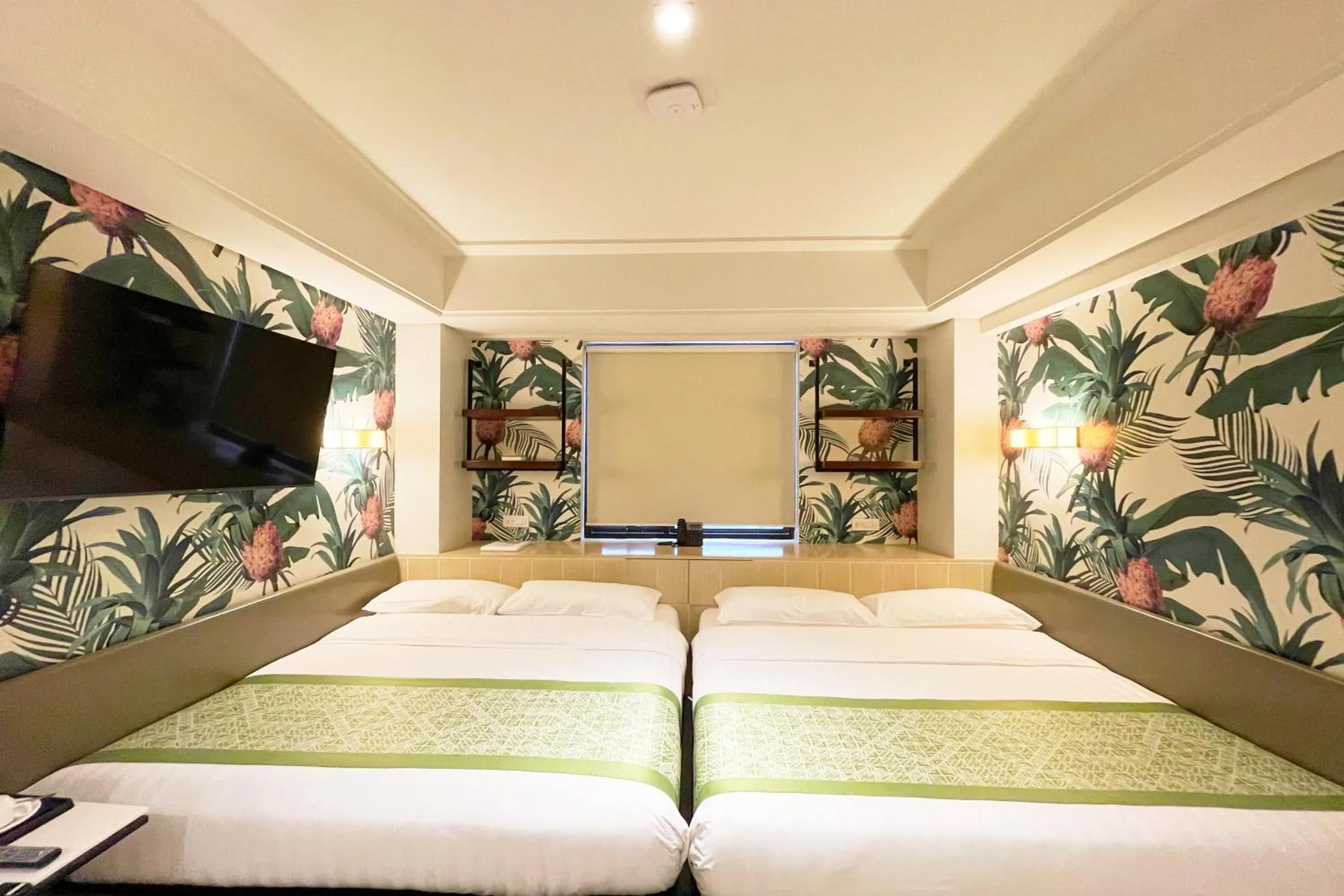 Bed in Mella Hotel Manila near NAIA Airport