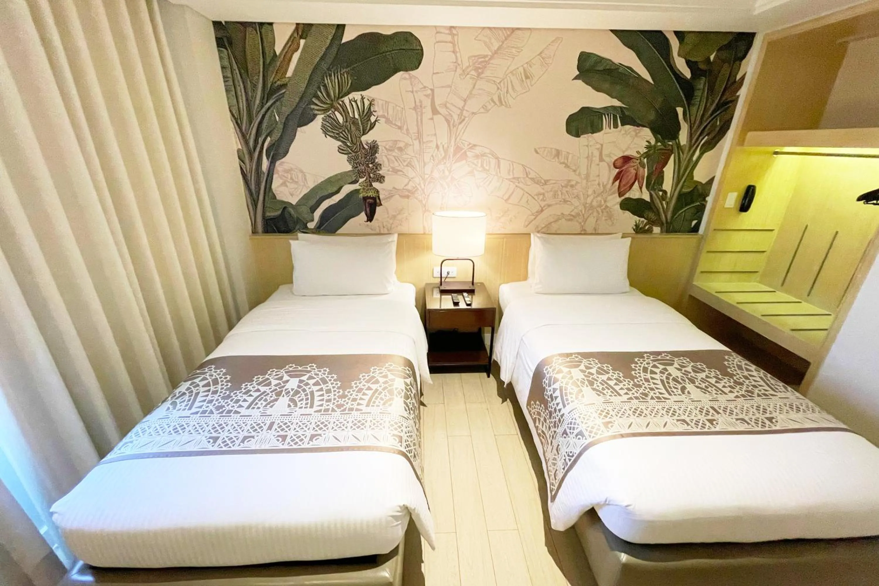 Bed in Mella Hotel Manila near NAIA Airport