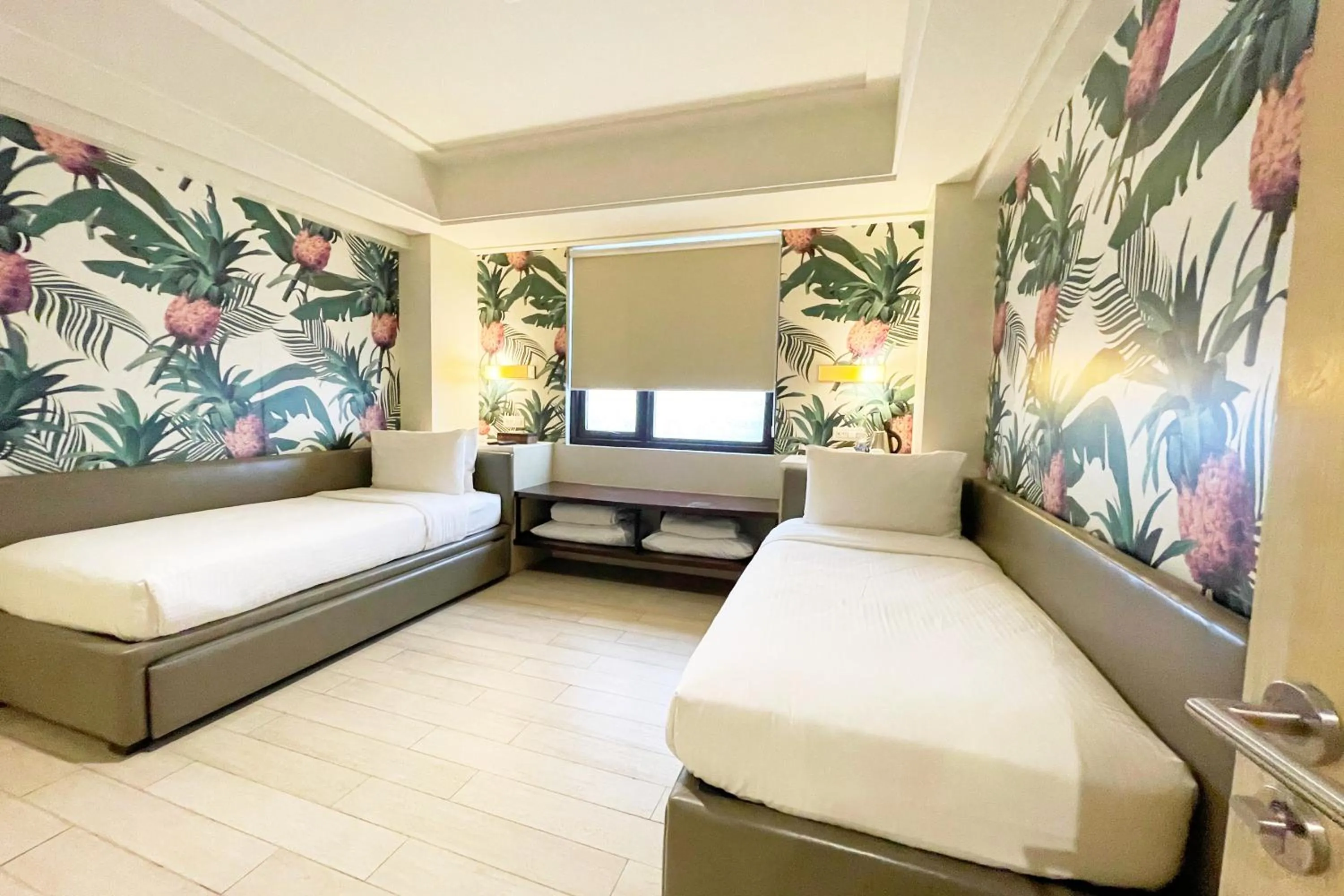 Bed in Mella Hotel Manila near NAIA Airport