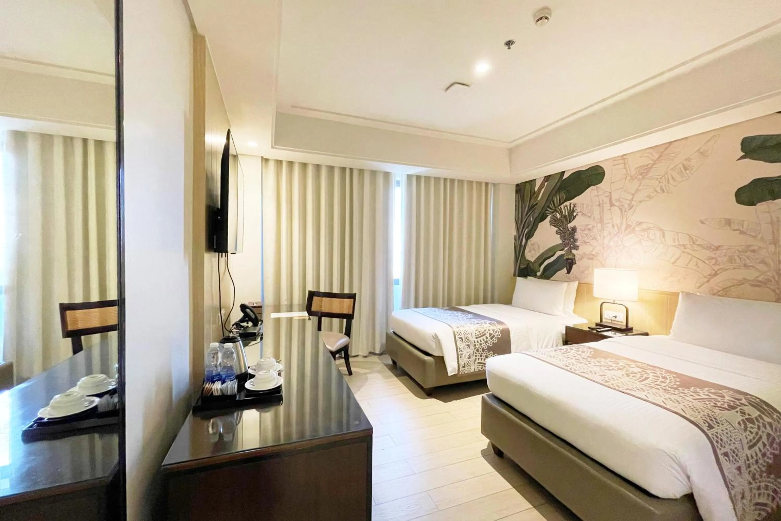 Bed in Mella Hotel Manila near NAIA Airport