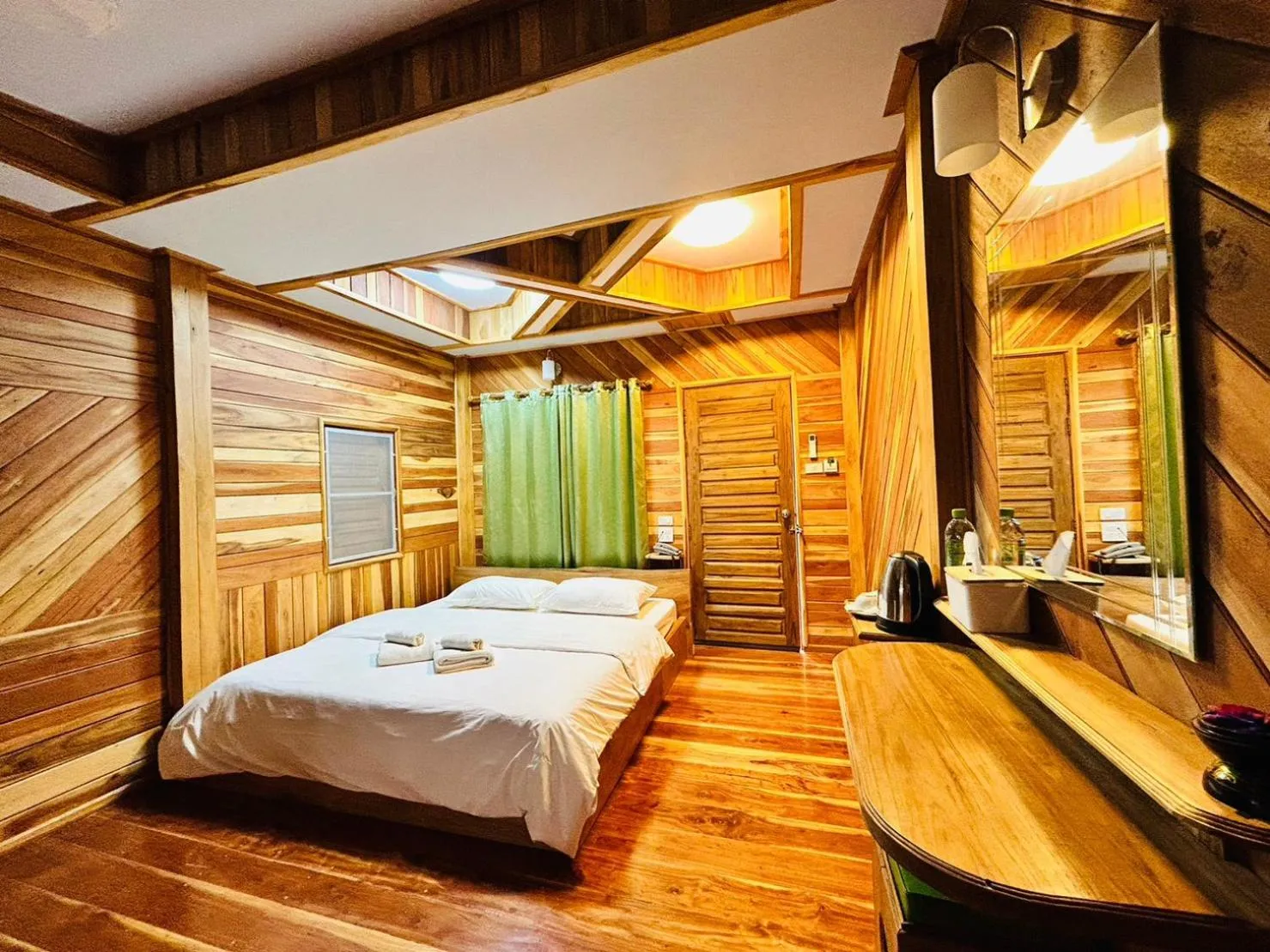 Bed in Magmai Hotel and Resort