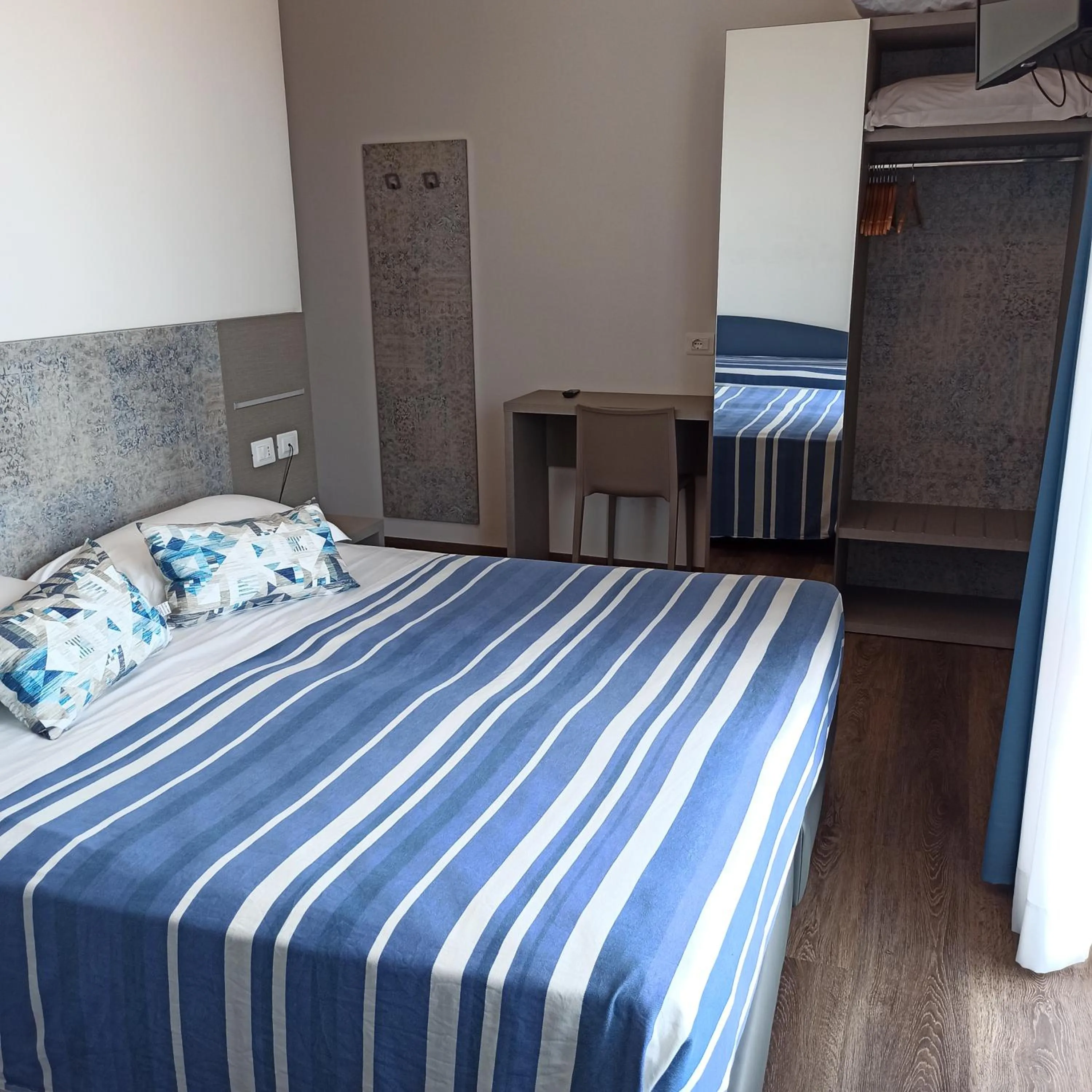 Bedroom in Real Park Hotel