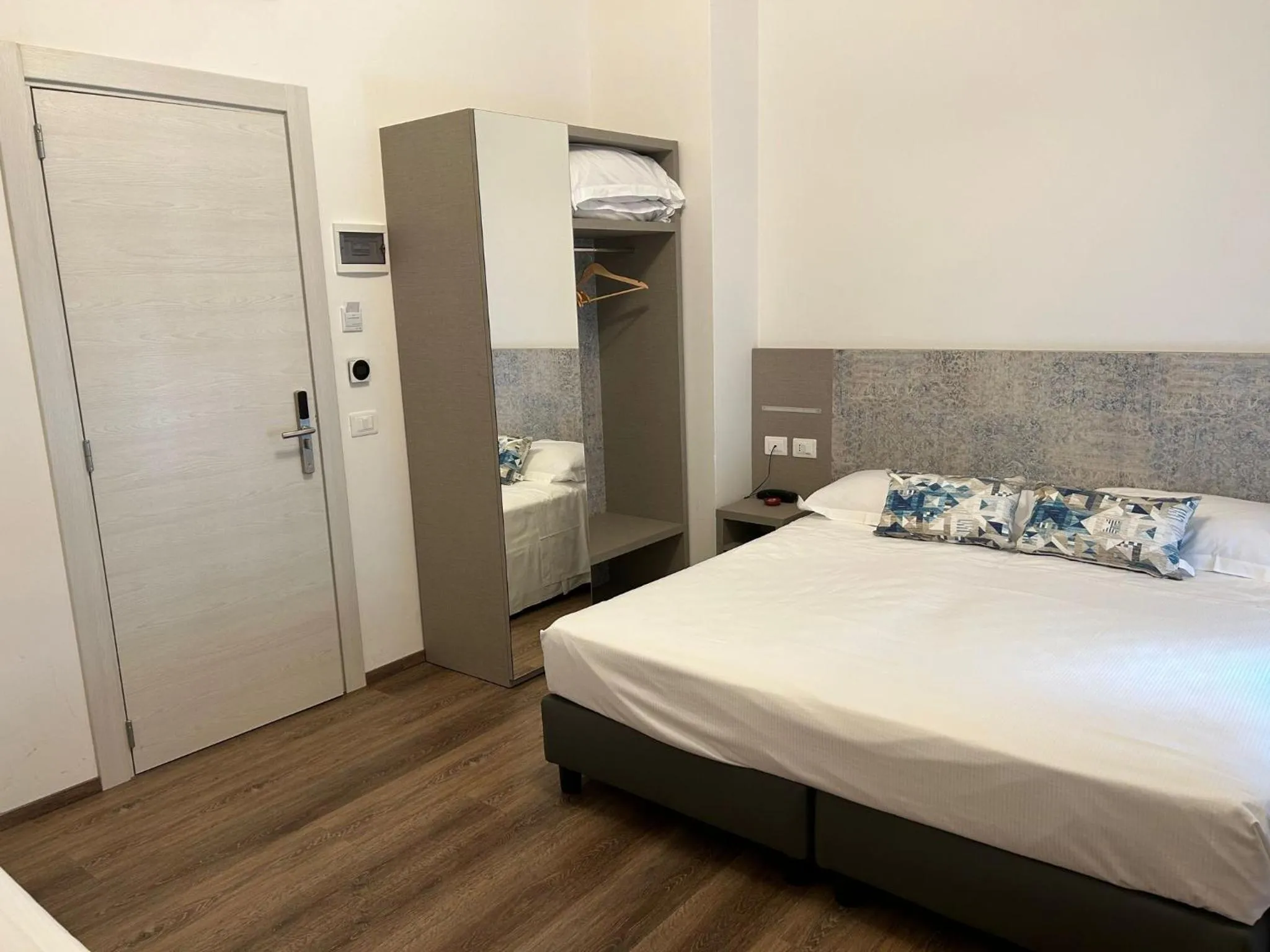 Bedroom in Real Park Hotel