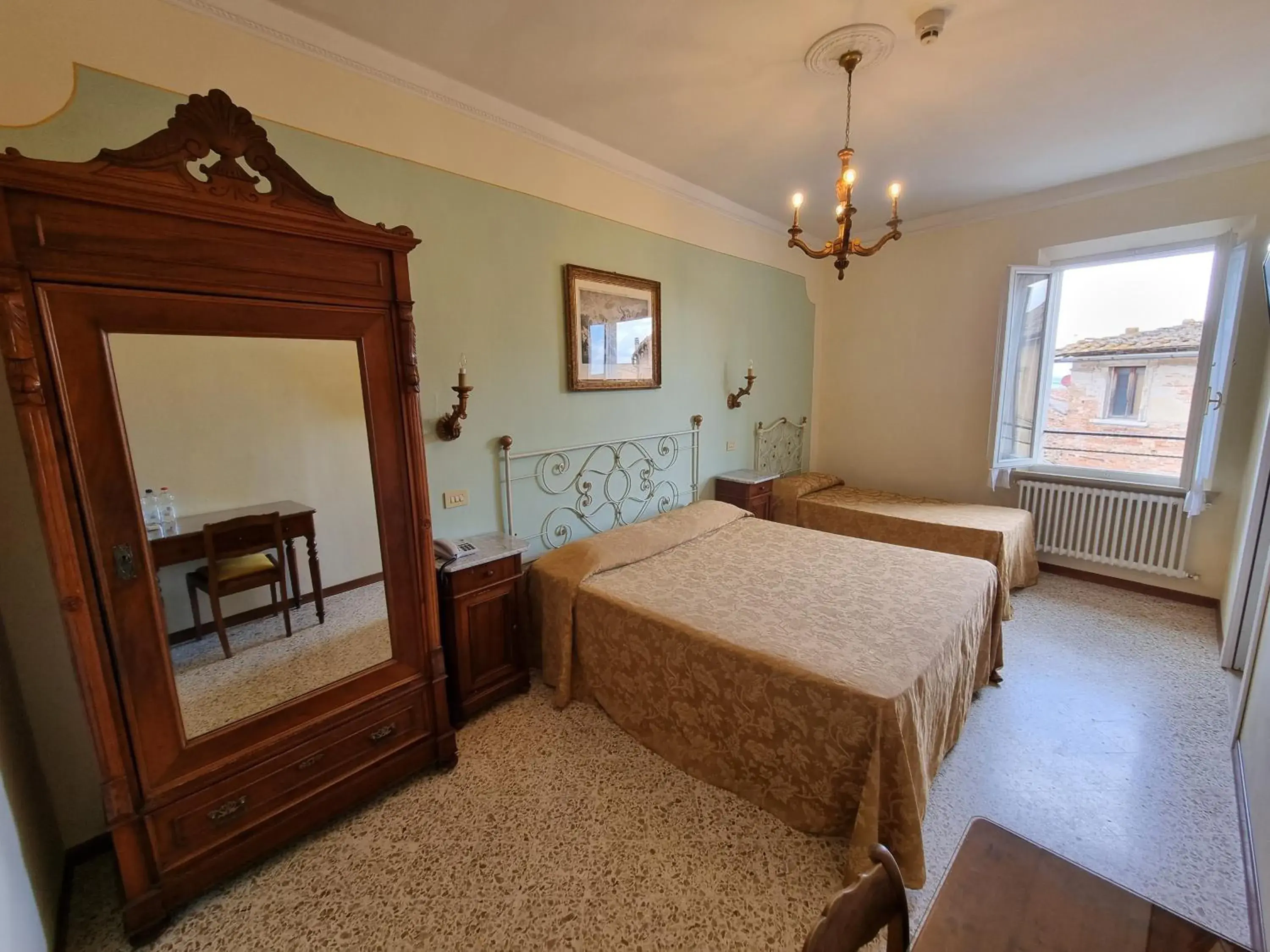 Triple Room with City View in Albergo Il Marzocco - Hotel dal 1860 Triple Room with City View in Albergo Il Marzocco - Hotel dal 1860