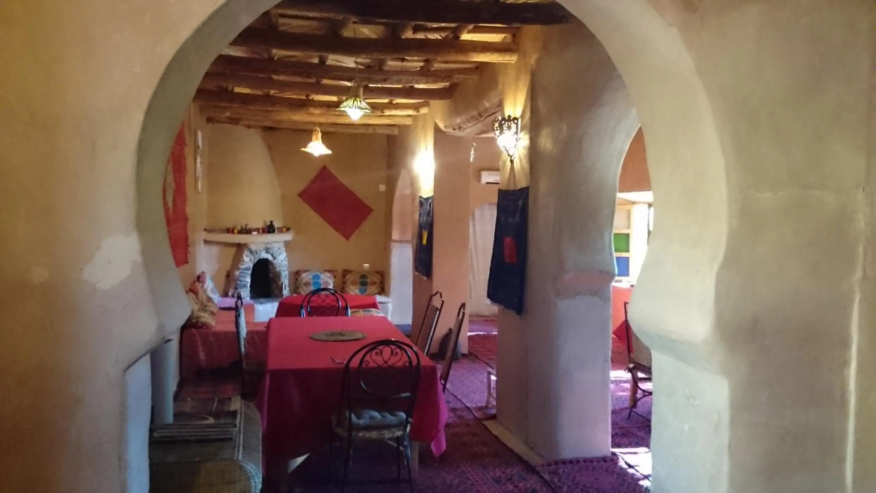 Communal lounge/ TV room in Kasbah Auberge Bassou