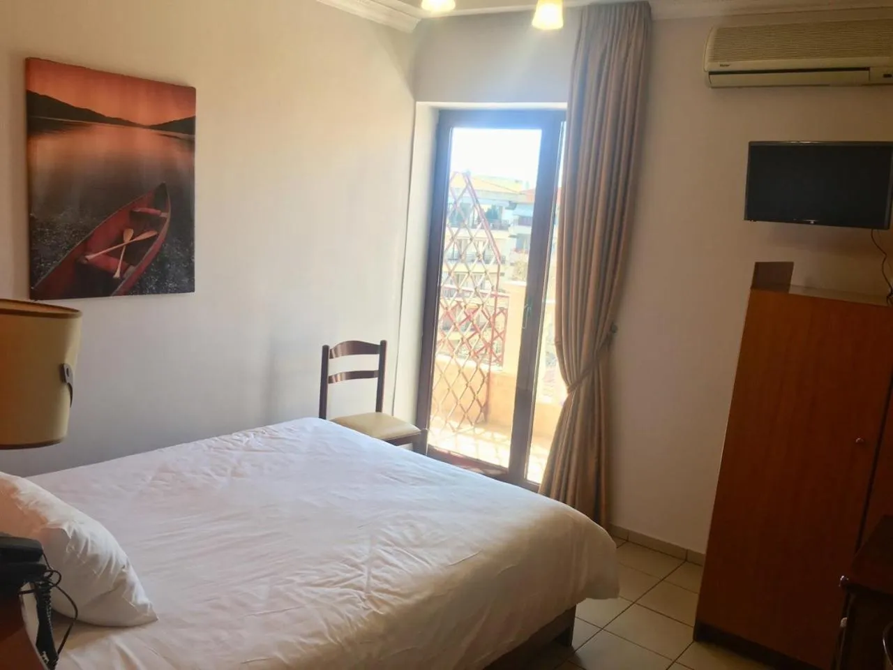 Bed in Hotel Olympion