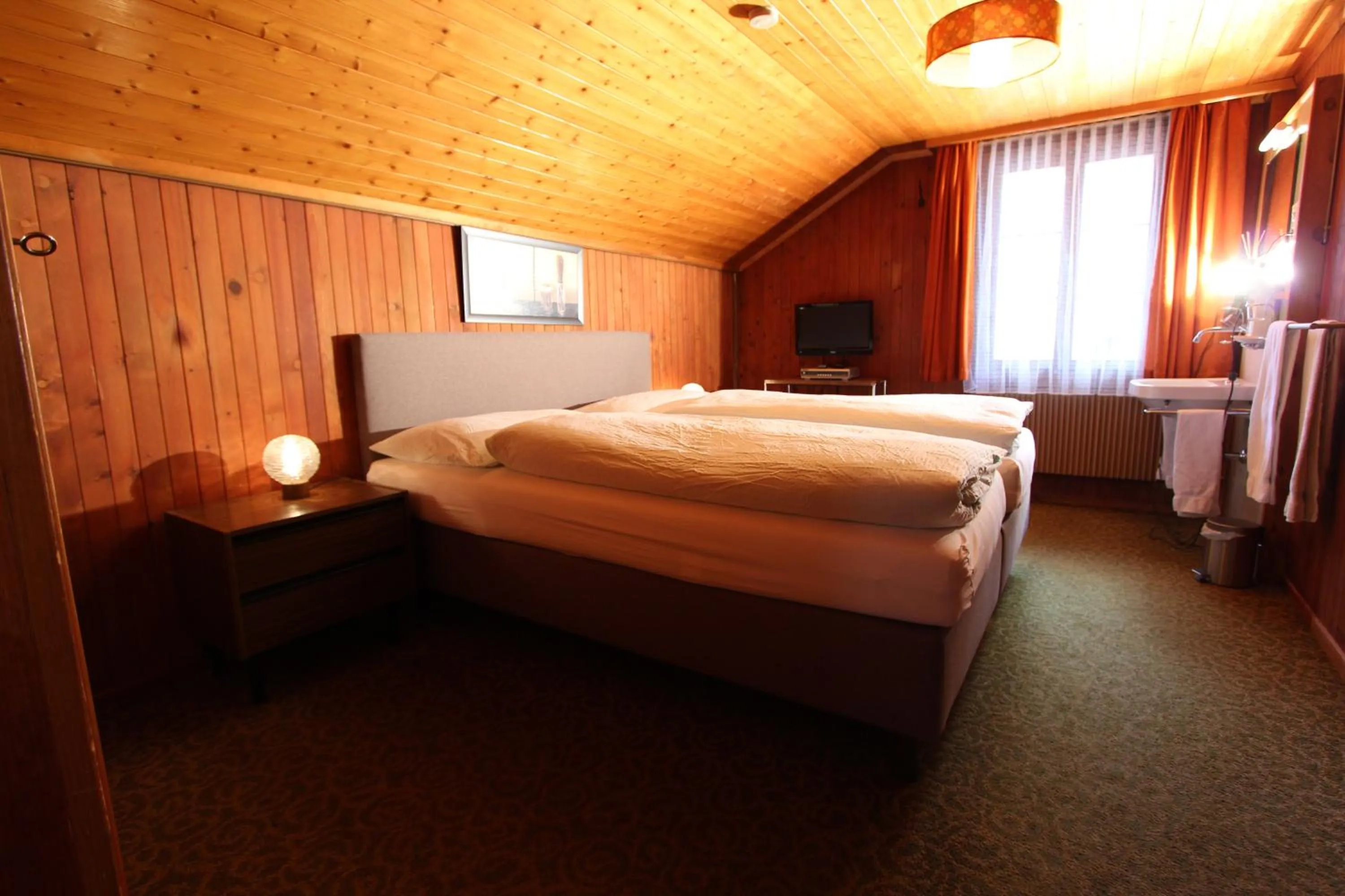 Photo of the whole room, Bed in Hotel-Restaurant Alpina