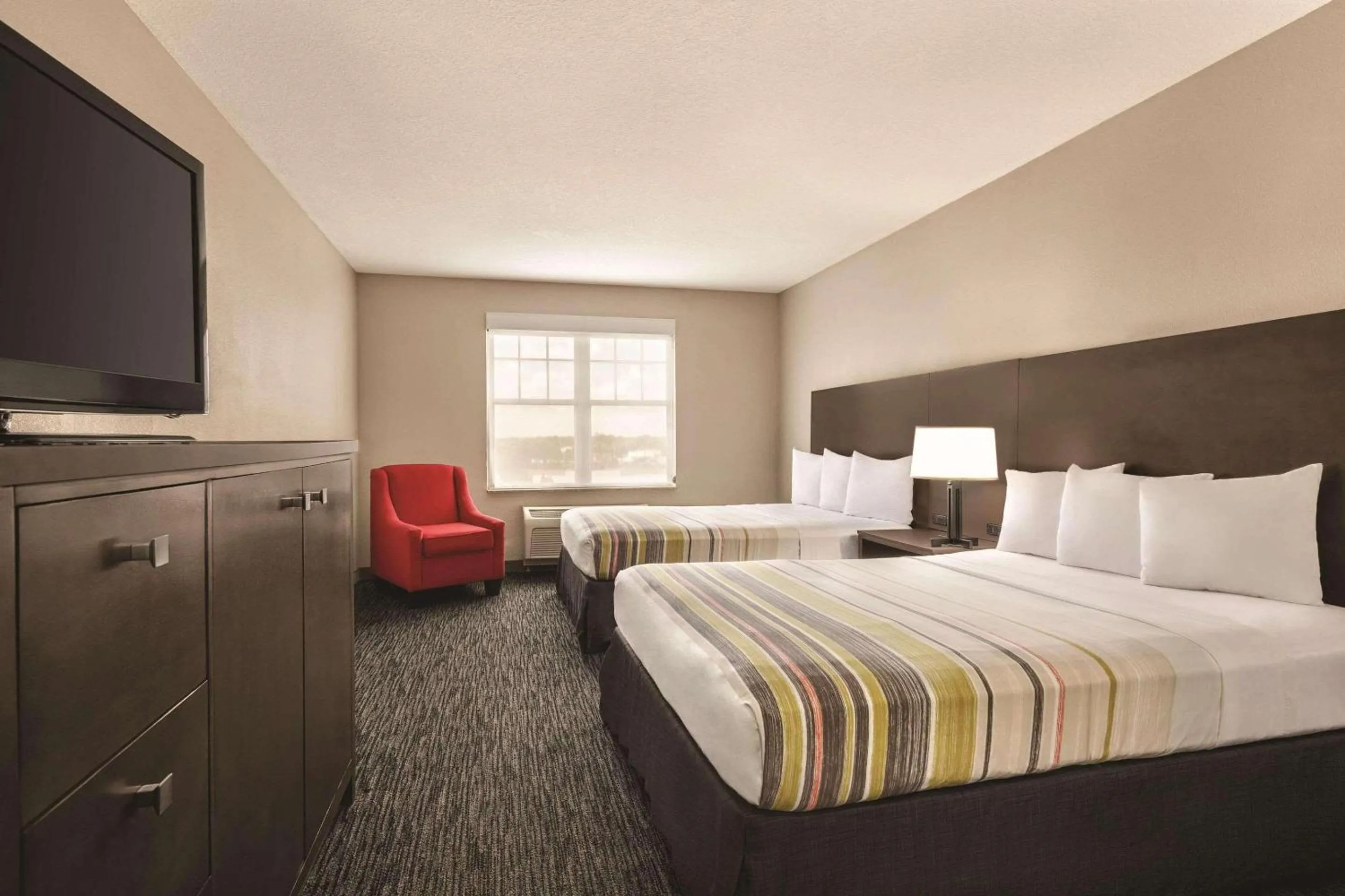 Bedroom, Bed in Country Inn & Suites by Radisson, Tampa-Brandon, FL